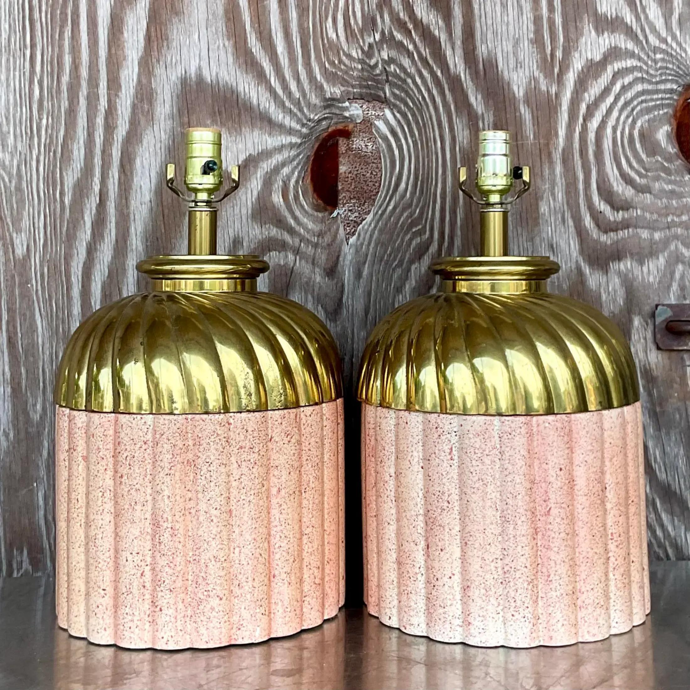 A fabulous pair of vintage Boho table lamps. A chic scalloped brass top over a glazed ceramic base. Acquired from a Palm Beach estate
