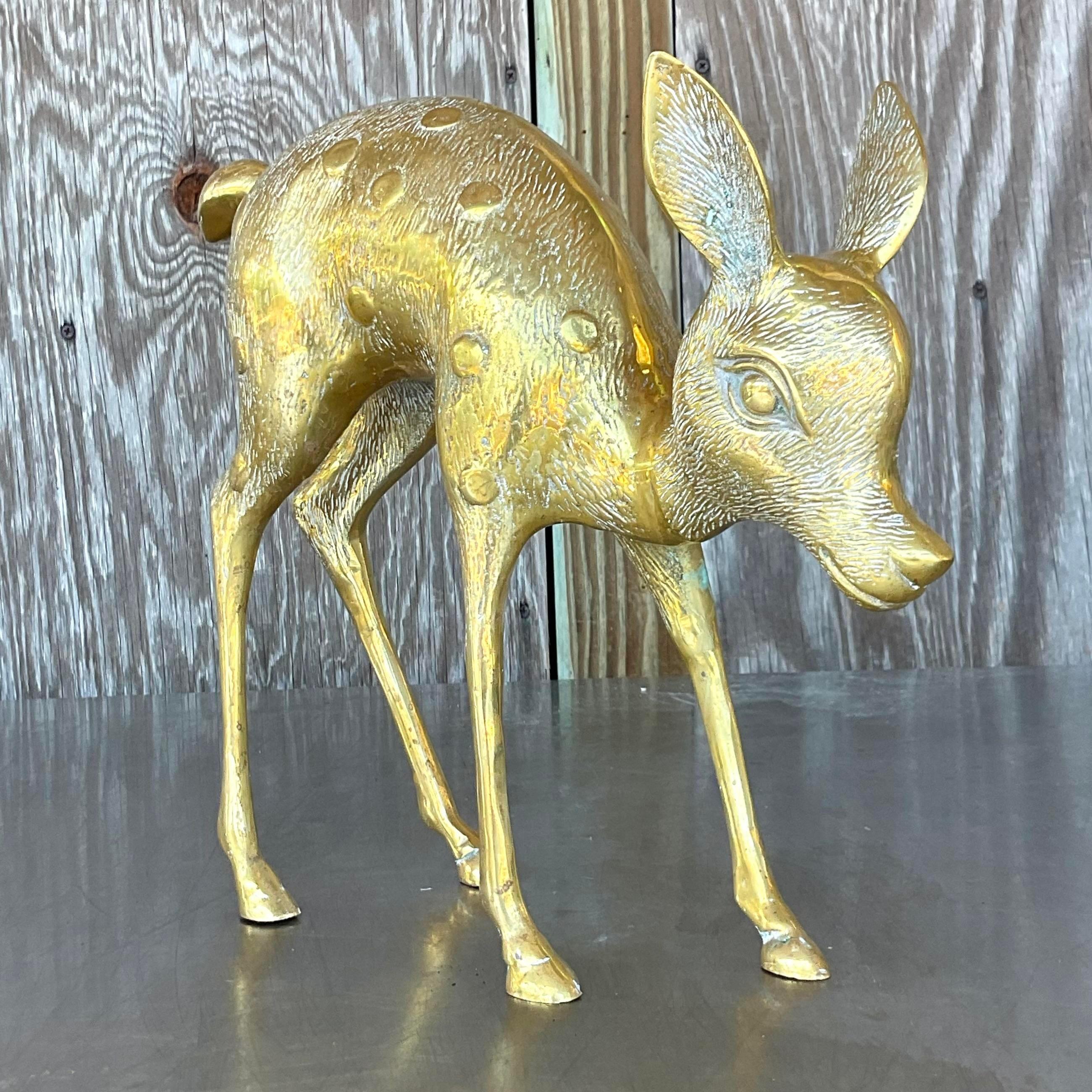 Add a touch of whimsy to your space with this Vintage Boho Brass Bambi Statue. This American-style piece captures the charm of the beloved character, crafted in brass for a timeless look that brings a sense of nostalgia and elegance to any room.
