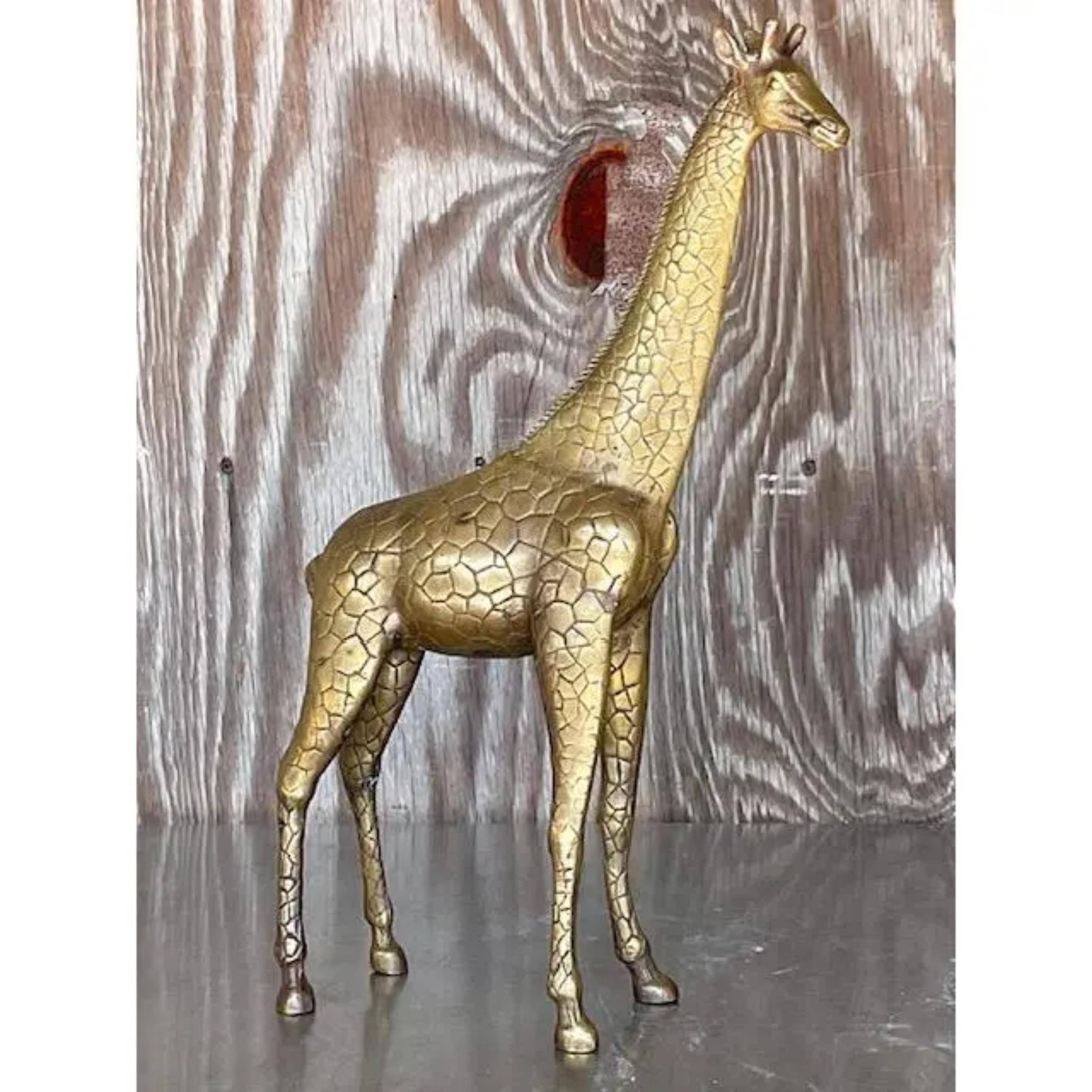 A terrific vintage Boho giraffe statue. A chic solid brass with beautiful attention to detail. Acquired from a Palm Beach estate