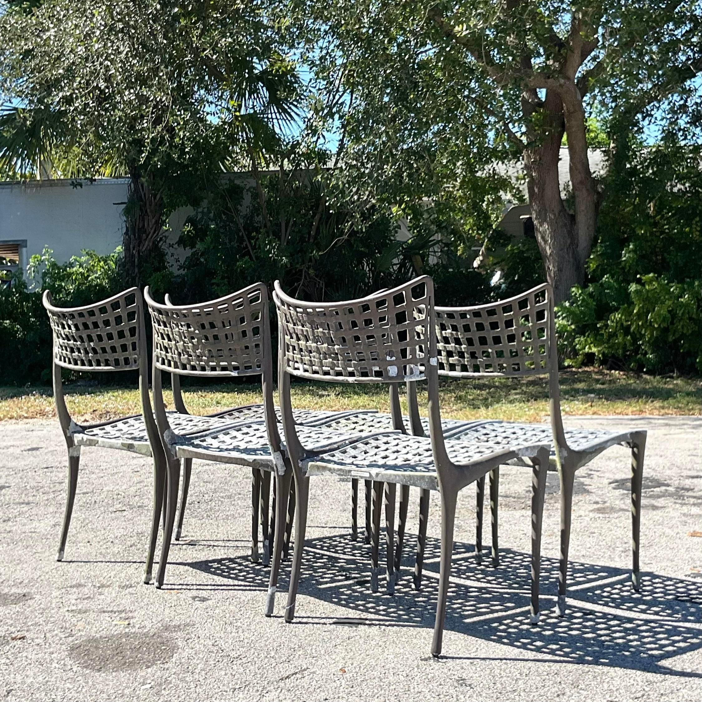 An incredible set of 6 outdoor dining chairs. Made by the iconic Brown Jordan group and tagged on the back. The rare and coveted Sol Y Luna design. The chairs are in great structural condition, but need to be repainted. Acquired from a Palm Beach