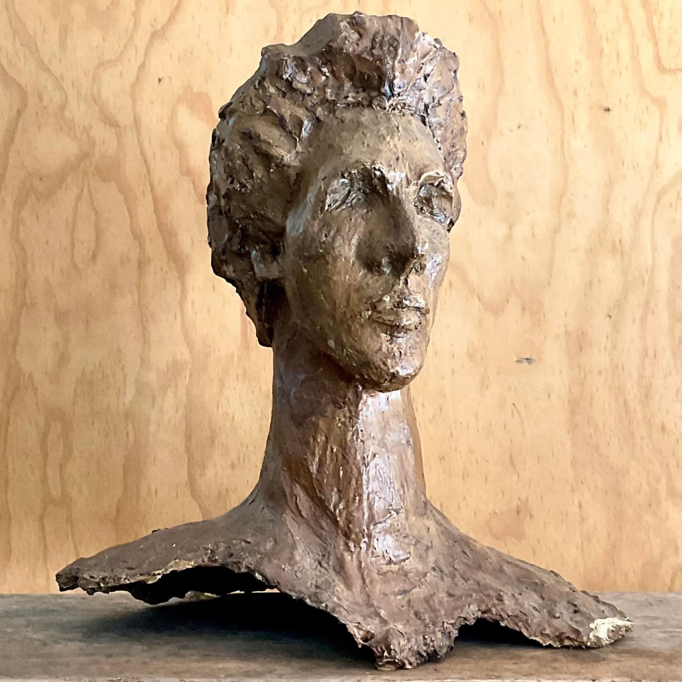 A fabulous vintage boho sculpture of man. A handsome bust of a gentleman with serious Hollywood hair. Plaster over fiberglass with lots of great texture. Acquired from a Palm Beach estate. Unsigned less

