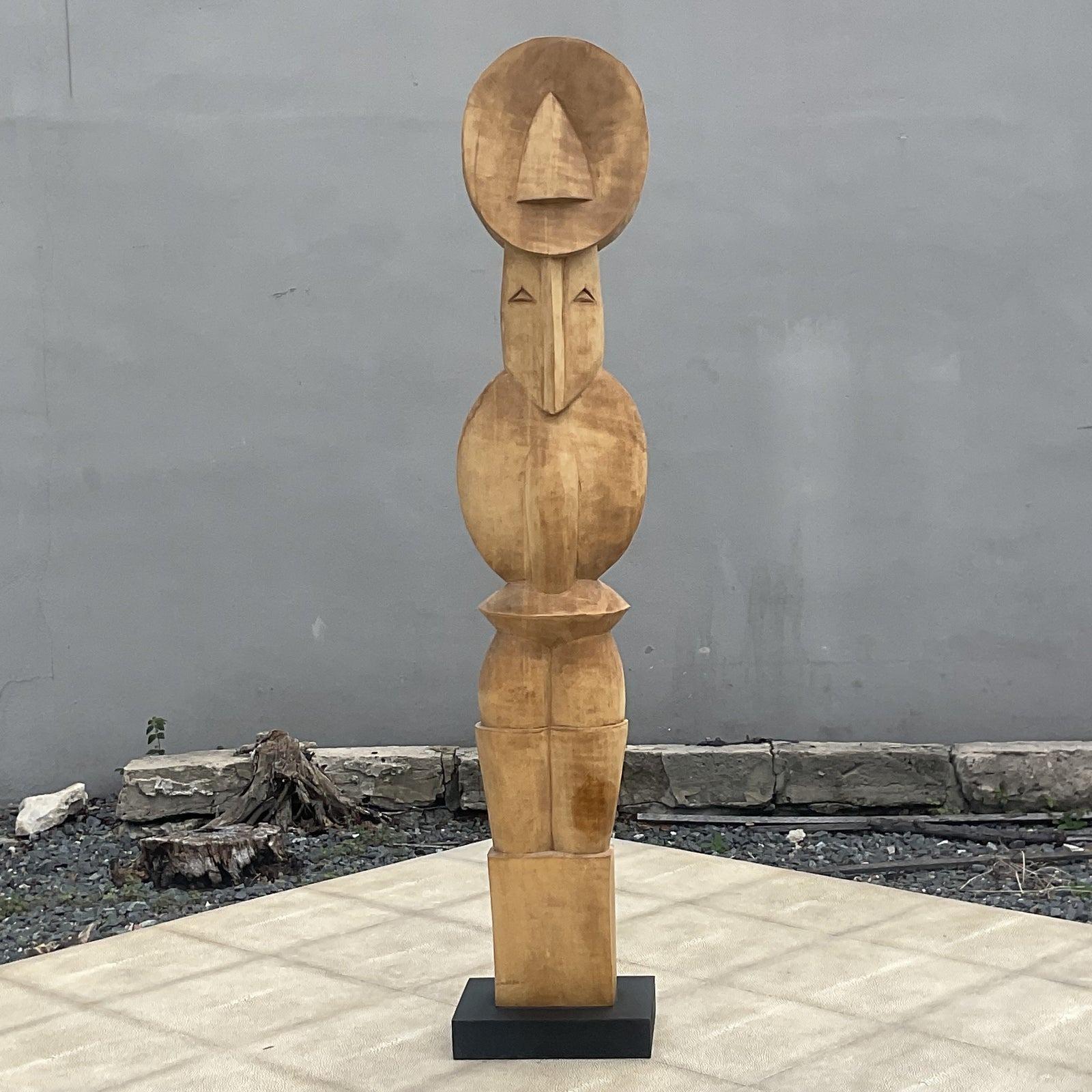A fabulous vintage Boho totem sculpture. A chic Abstract composition rendered in wood. Acquired from a Palm Beach estate.