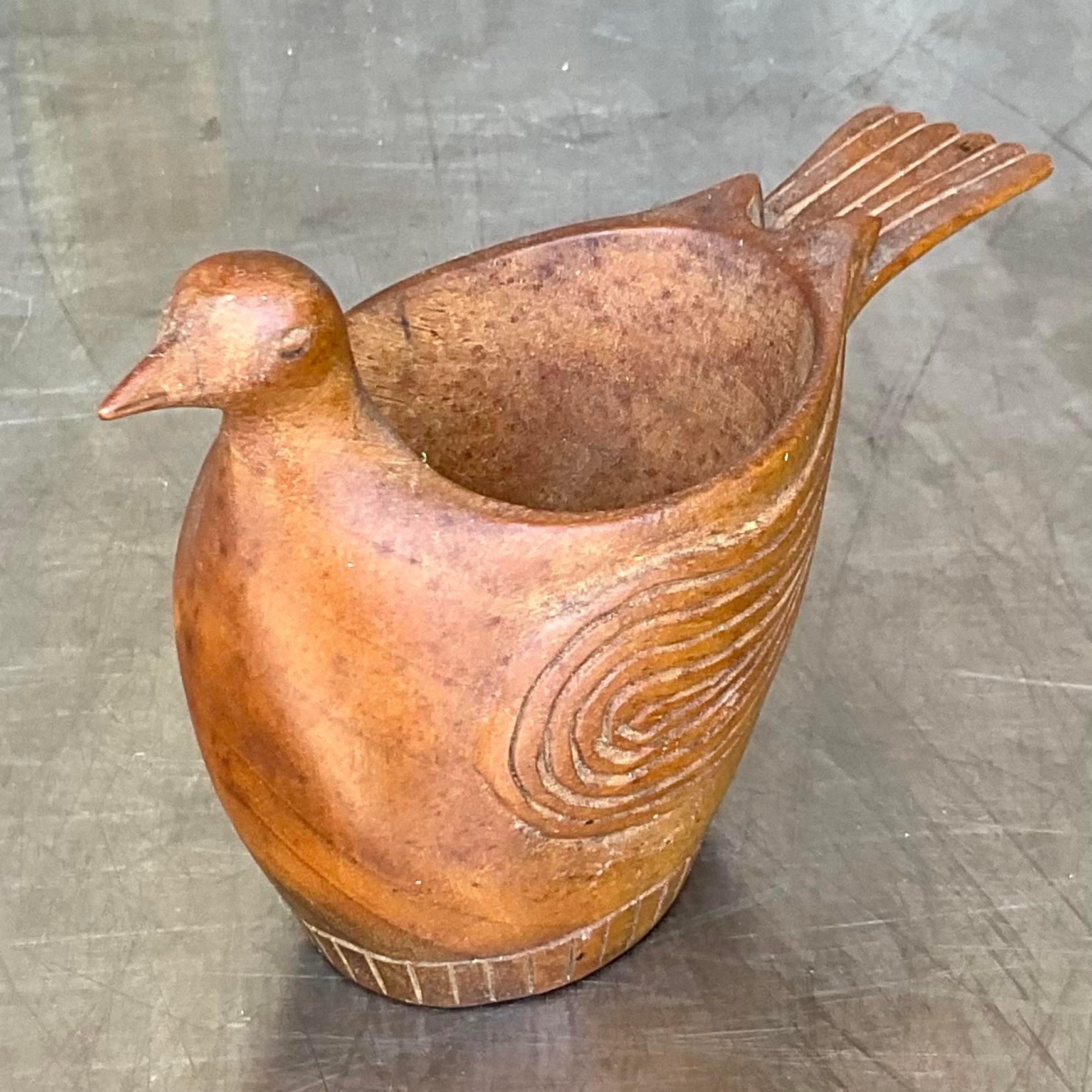 A fabulous little Boho carved votive holder. A sweet little bird with a primitive detail. A great gift. Acquired from a Palm Beach estate.