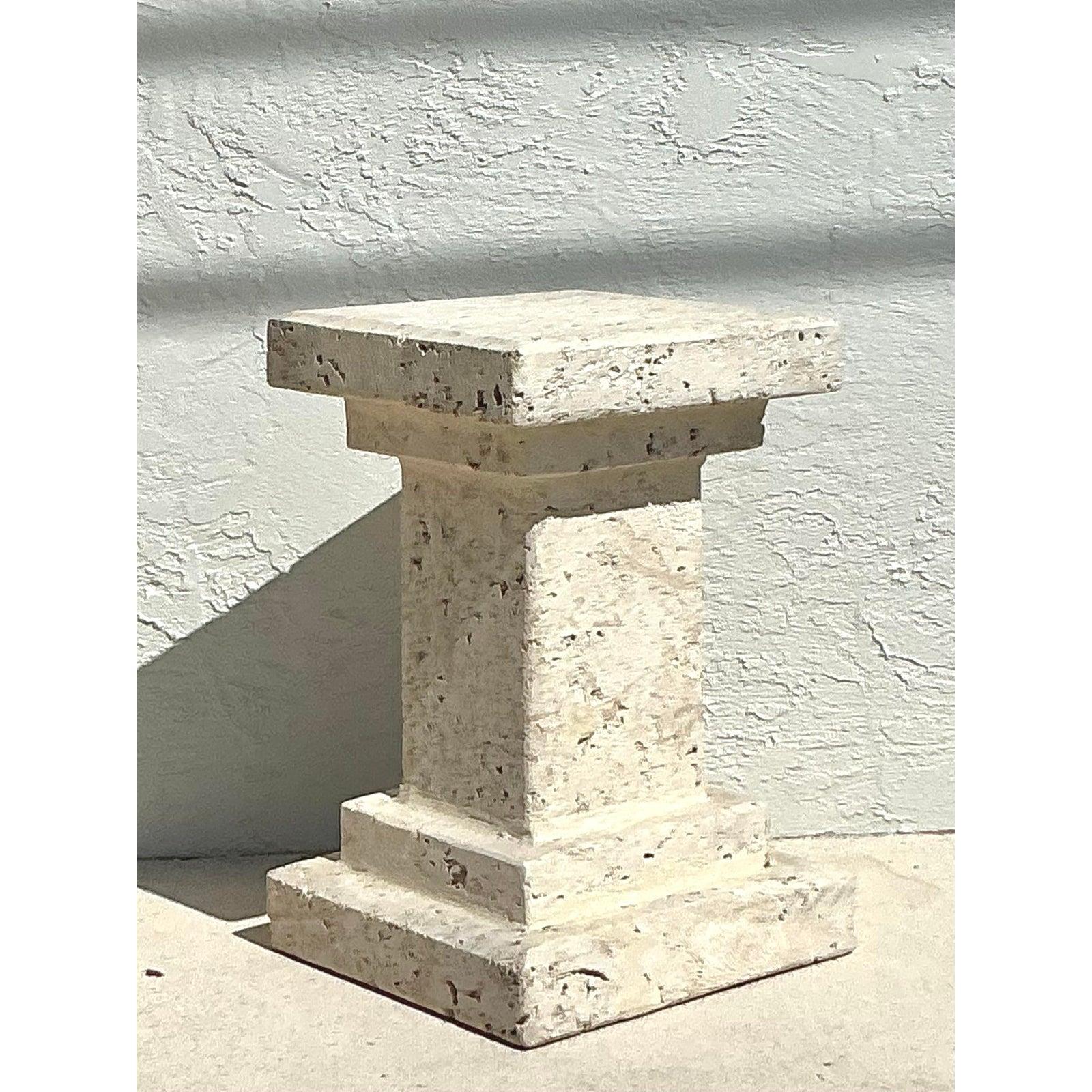 Elevate your interior with the raw, organic beauty of this vintage coquina stone pedestal. Masterfully carved, this piece showcases the unique texture of coquina—a natural limestone composed of shell fragments—lending it an incredible sense of