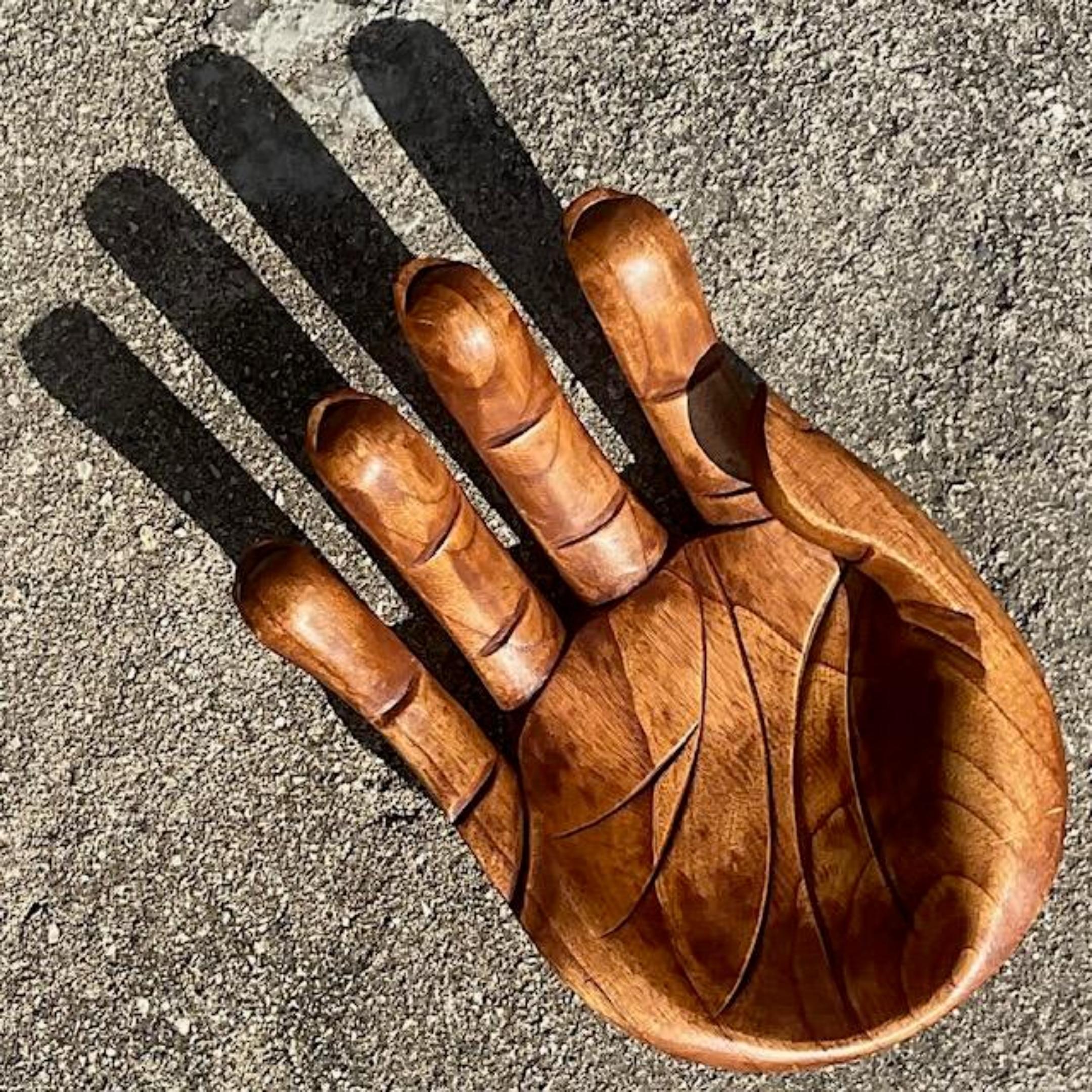 A fabulous vintage Boho wood hand. A chic carved creation with lots of surface detail. Perfect as is or pill the center with your treasured objects. A really beautiful piece. Acquired from a Palm Beach estate.