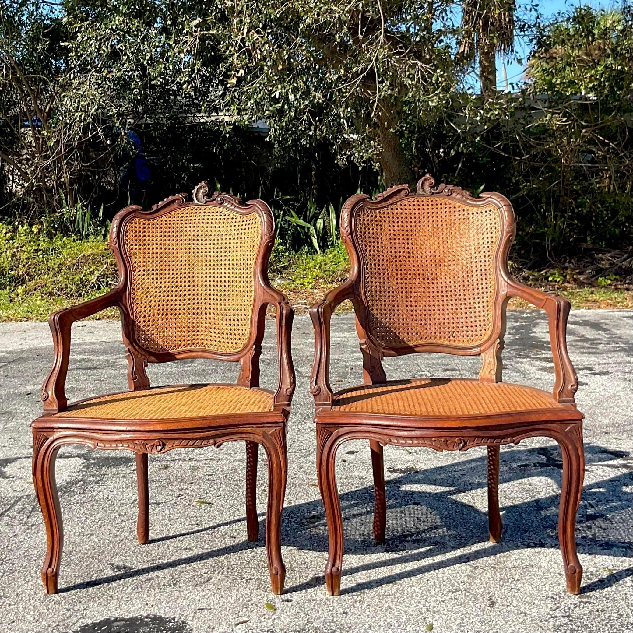 Vintage Boho Carved Wooden Chairs With Inset Cane Panels - a Pair In Good Condition For Sale In west palm beach, FL