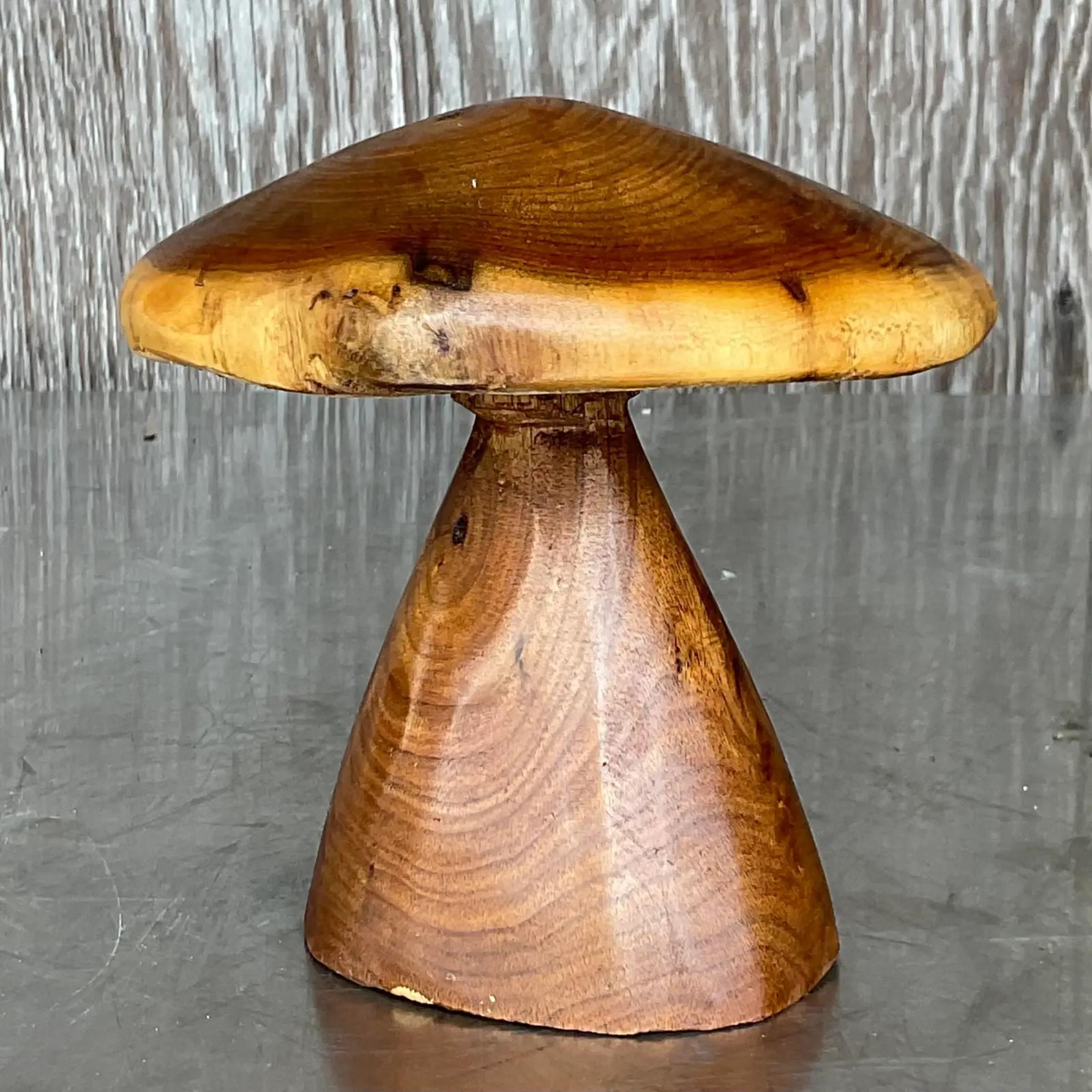 A fabulous vintage Boho solid mushroom. A charming hand carved specimen with beautiful wood grain detail. Acquired from a Palm Beach estate.