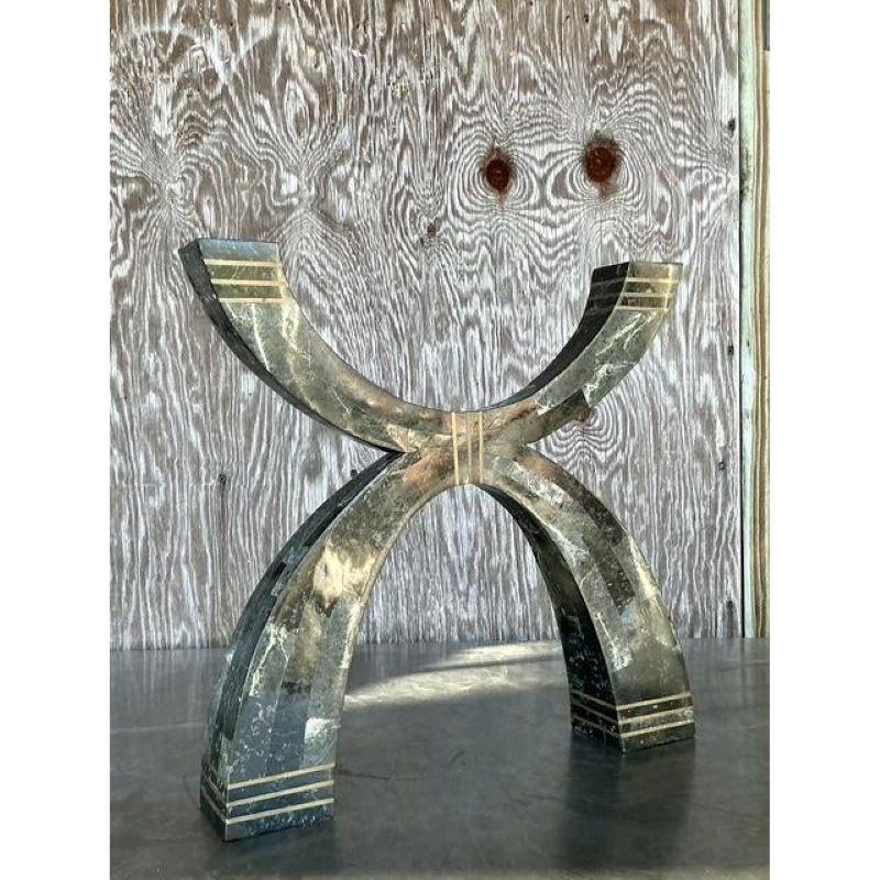 Add a sculptural statement to your décor with this stunning vintage Casa Bique tessellated stone and bronze candelabra. Featuring a bold, geometric arching form, this candelabra is crafted from meticulously arranged green marble with rich veining