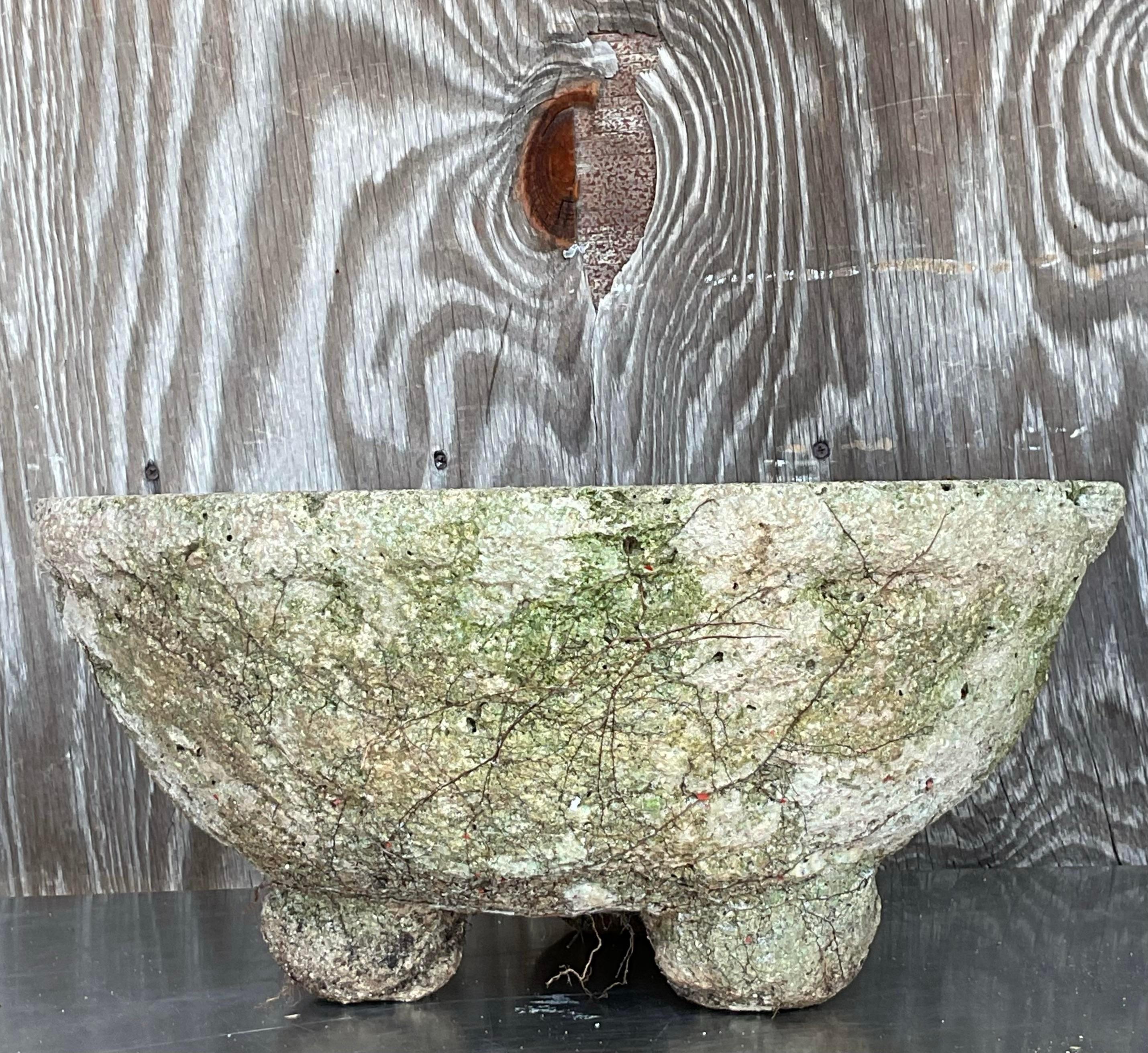 Set of 2 Vintage Boho Cast Concrete Bowl Planters, featuring a rustic finish with a minimalist, earthy design. Ideal for adding a touch of natural bohemian style to your outdoor or indoor space. Acquired from a Palm Beach estate.

Second planter -