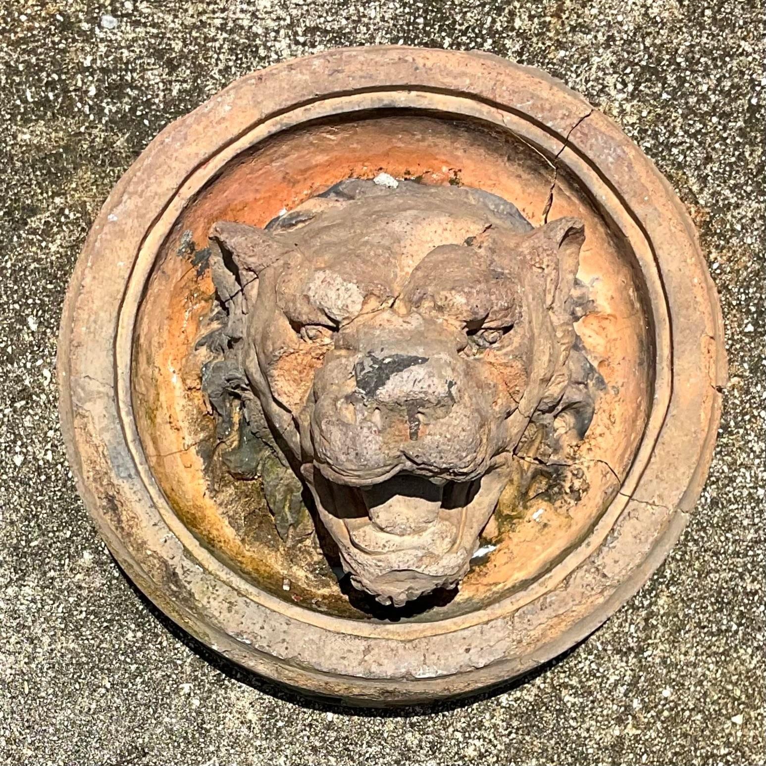 concrete lion head