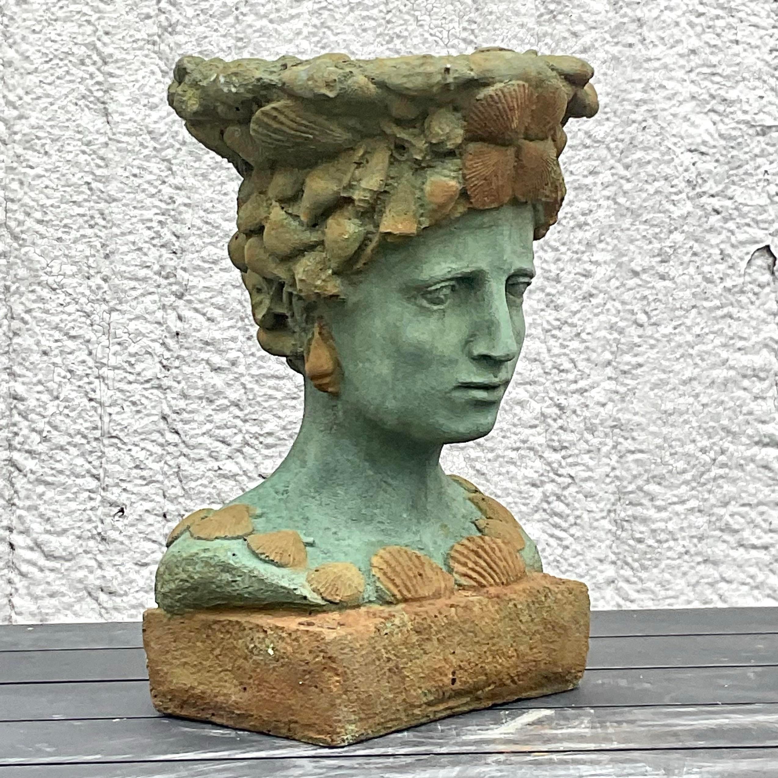 Seaside Serenity: Channel coastal vibes with this Vintage Boho Cast Concrete Woman In Shells Planter. A unique fusion of artistry and functionality, it brings a touch of the ocean's beauty to your home, American style. Acquired from a Palm Beach