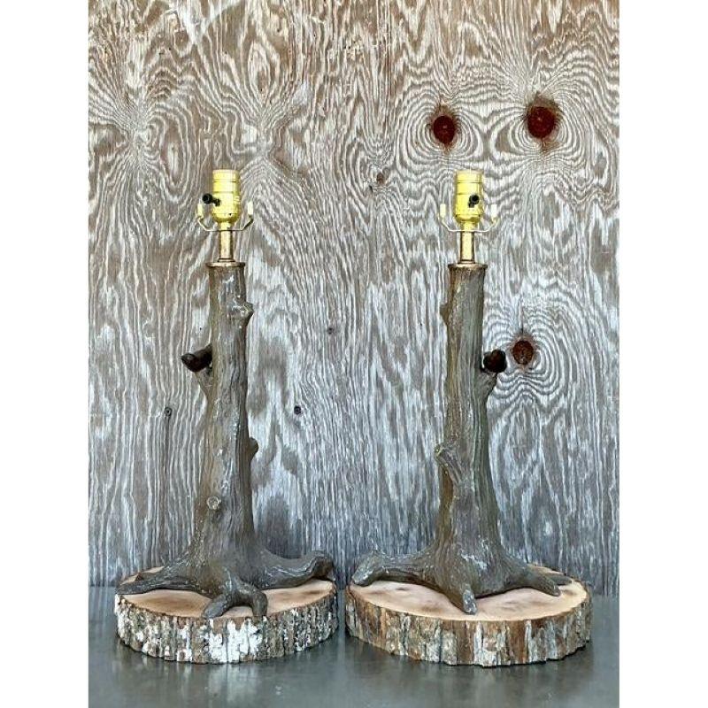 Introduce a whimsical touch of nature and vintage charm to your home with this delightful pair of cast iron table lamps, featuring an enchanting 