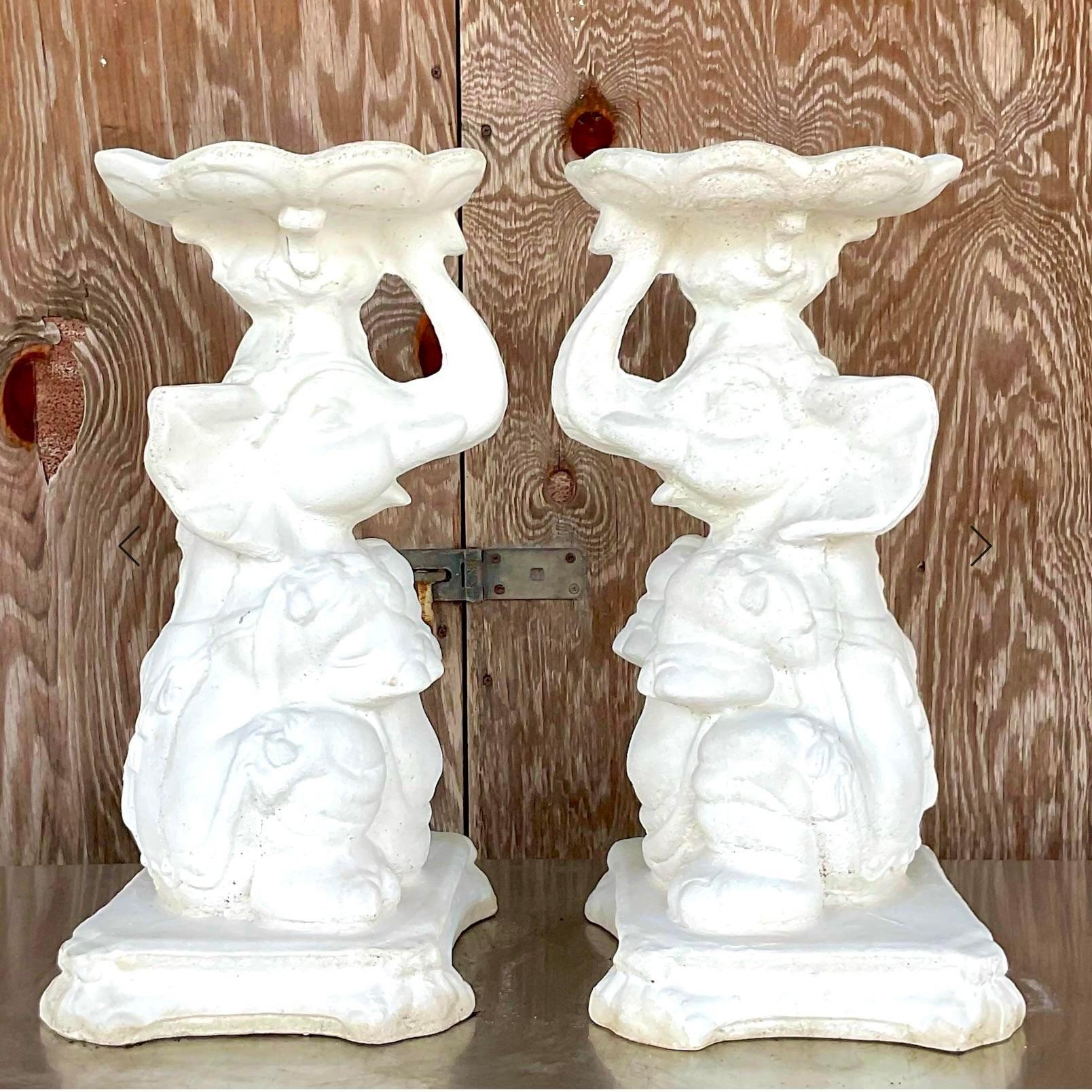 A fabulous pair of vintage Boho elephants. Solid cement forms with a plaster white finish. Perfect indoors or outside. Just add glass and make them tables. Acquired from a Palm Beach estate.