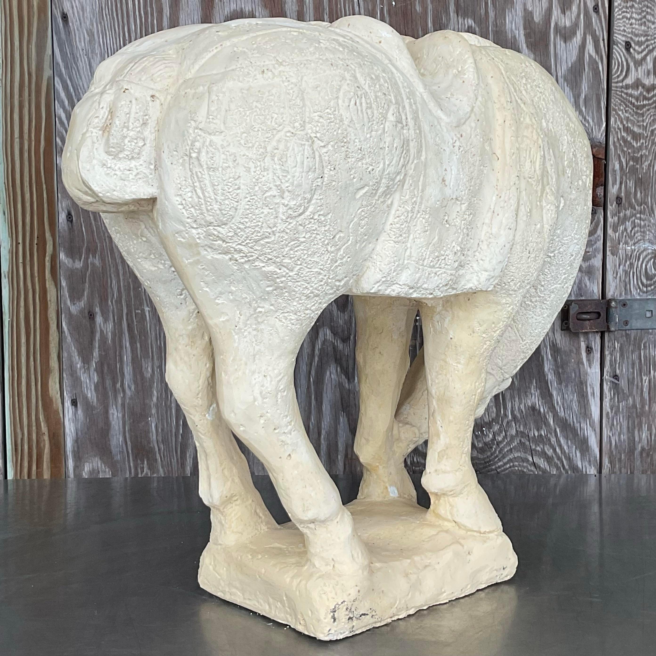 Bring history to life with this Vintage Boho Ceramic Tang Dynasty Horse. Expertly crafted with intricate details, this piece captures the spirit of ancient China while adding a touch of bohemian flair to your decor. Perfect for art lovers and
