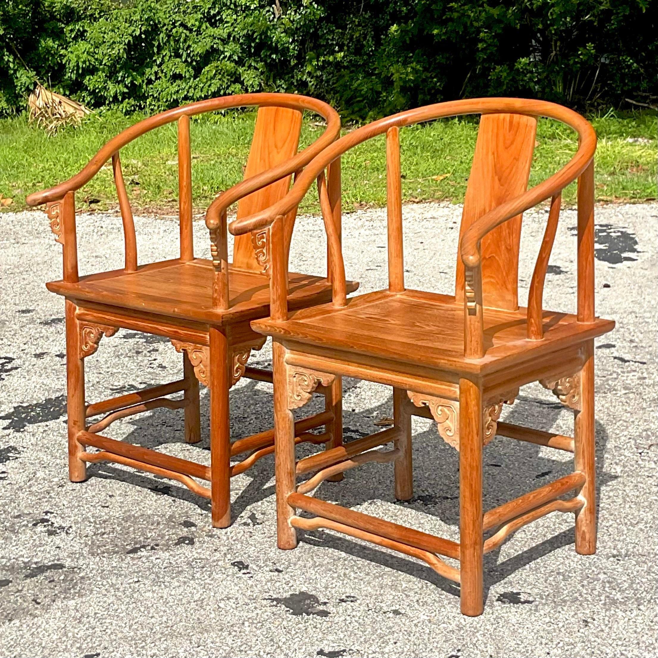 A fabulous pair of vintage Boho chairs. A chic high back Emperors style in a teak wood with a cerused finish. Contemporary, but classic at the same time. Acquired from a Palm Beach estate.