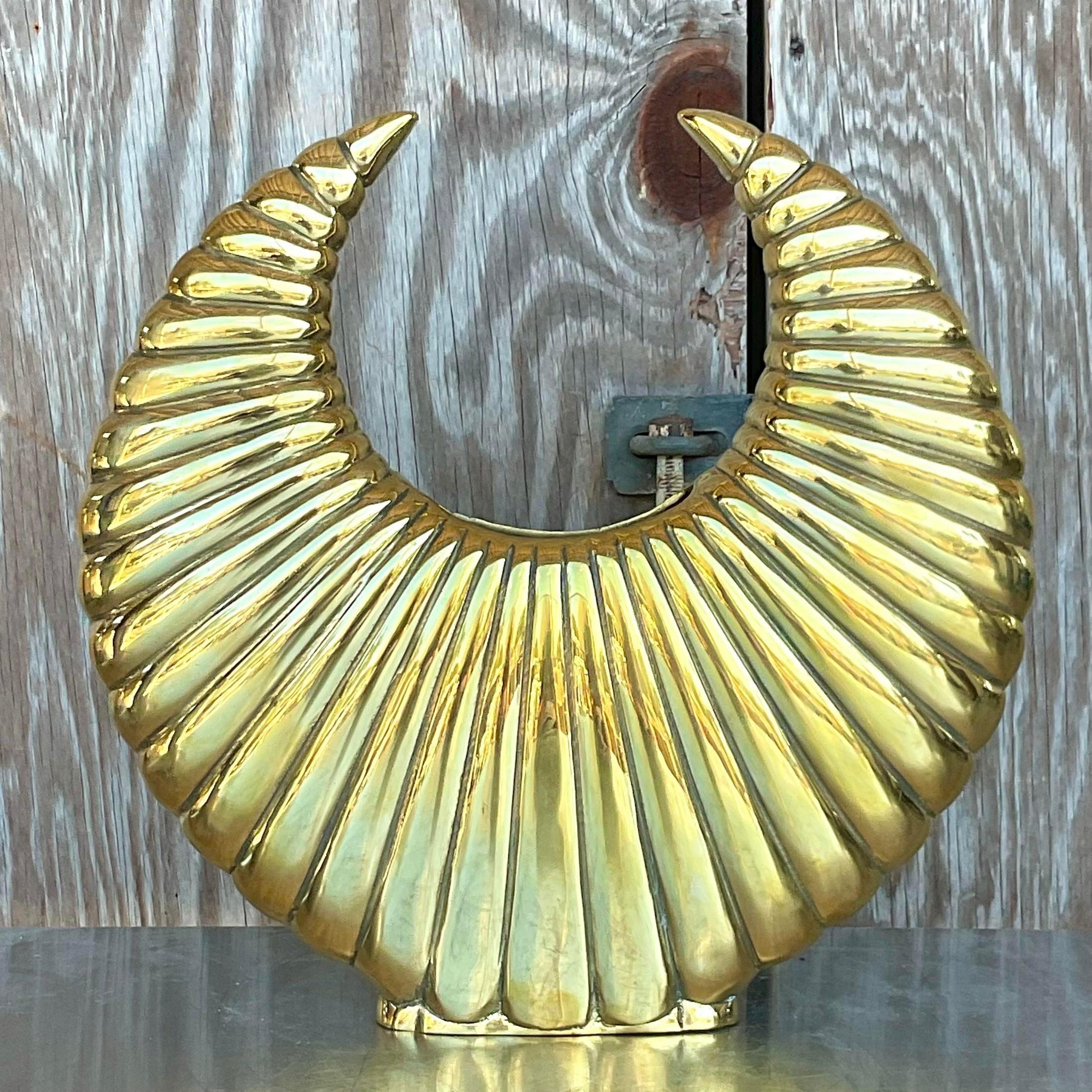A fantastic vintage Boho vase. Chic channel tufted brass in a horse shape. Acquired from a Palm Beach estate.