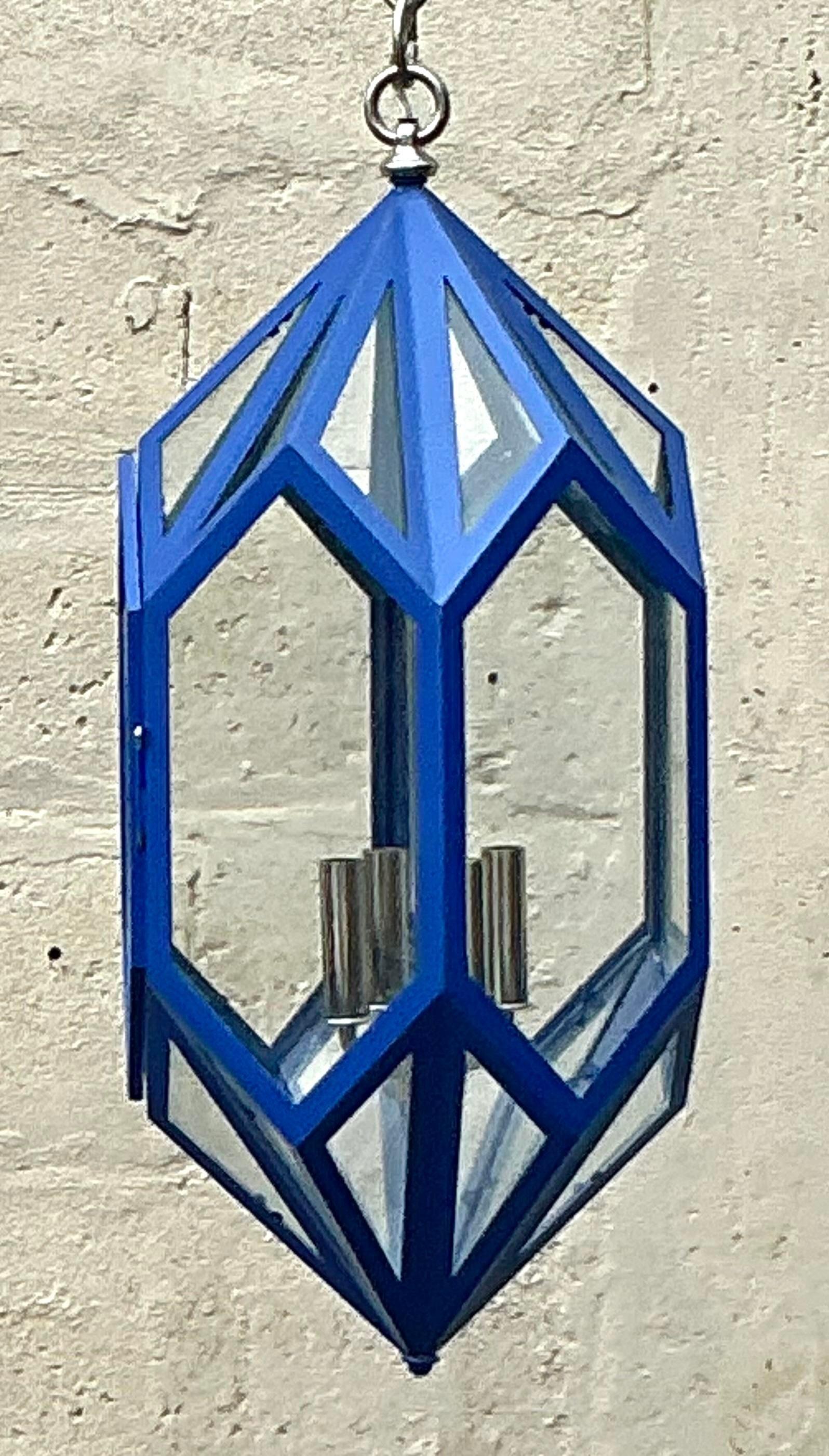 Illuminate your space with the striking elegance of this Vintage Boho Charles Edwards Custom Cobalt Lantern. Handcrafted with exquisite attention to detail, this lantern features a deep cobalt blue finish that adds a bold pop of color to any room.