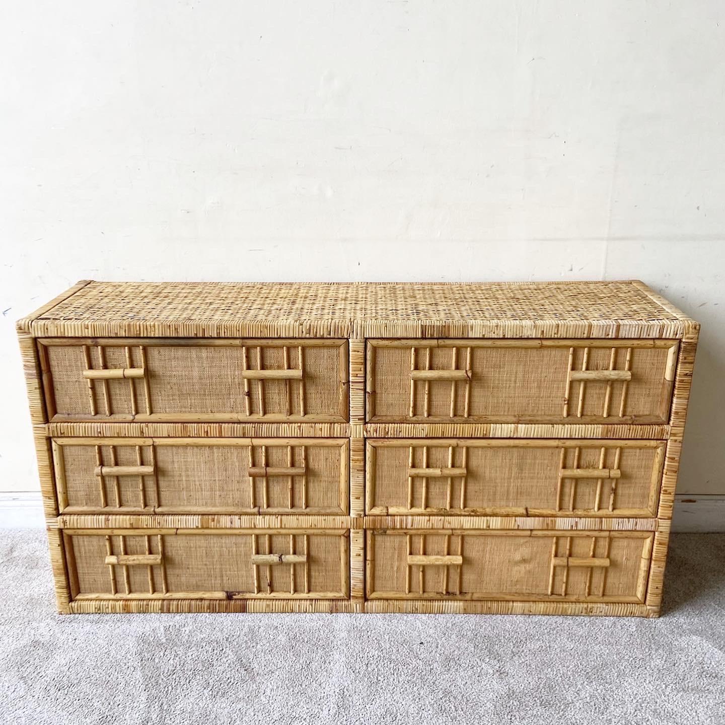 Amazing vintage bohemian rattan dresser. Features a shocker too with bamboo framing the drawers and bamboo drawer pulls.