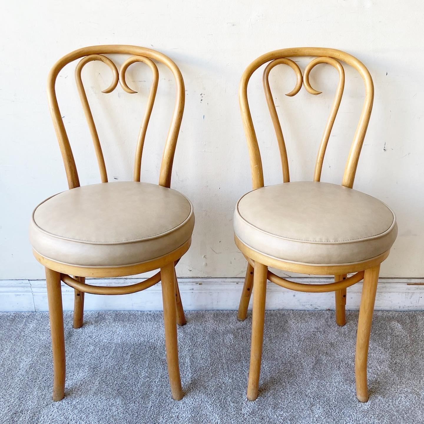 Vintage bentwood cafe Bistro dining chairs - Set of 4. Set includes (4) chairs, round seats with fan vinyl upholstery, original label, great style and form.