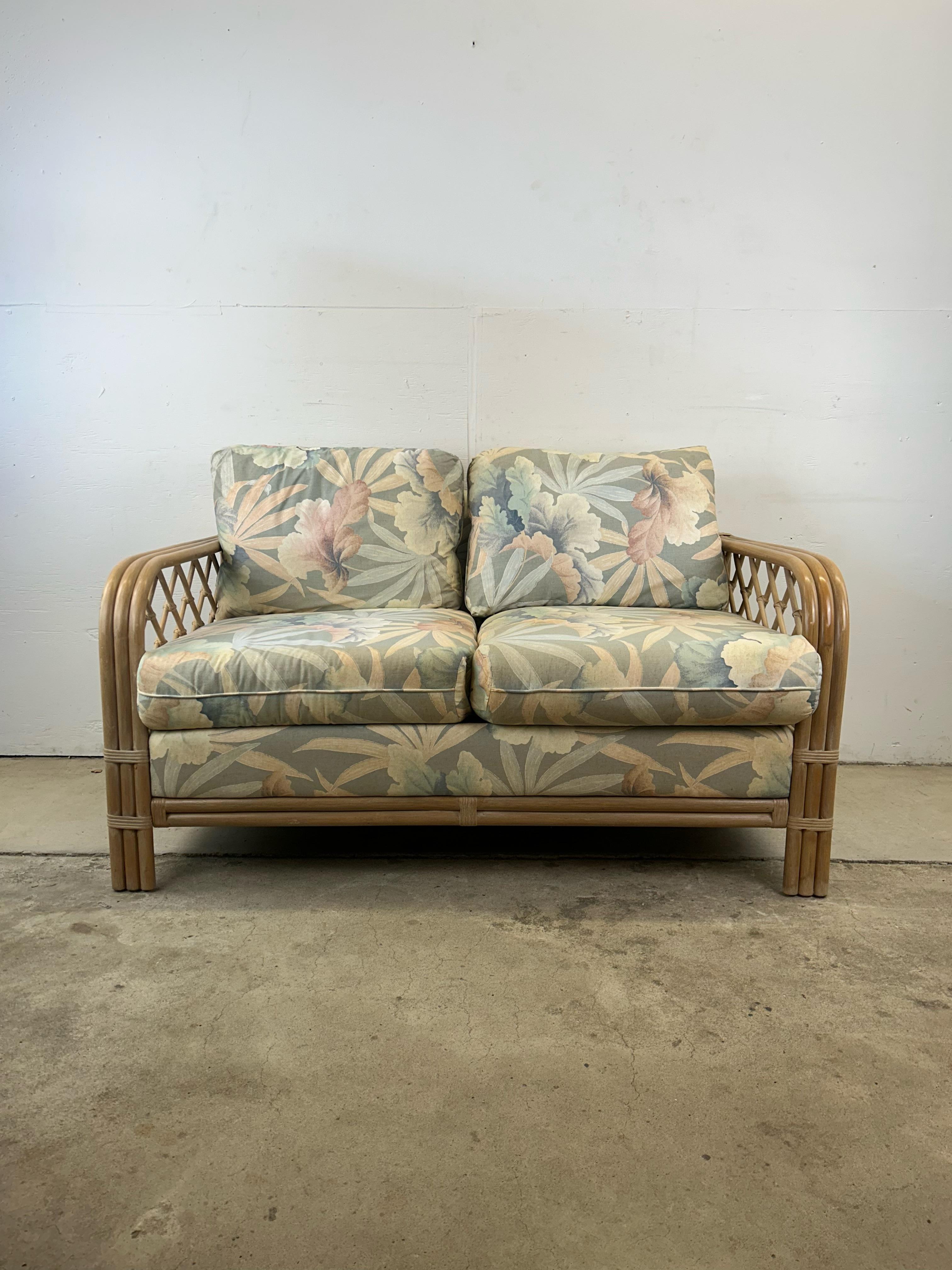 Bohemian Vintage Boho Chic Rattan Loveseat with Floral Upholstery For Sale