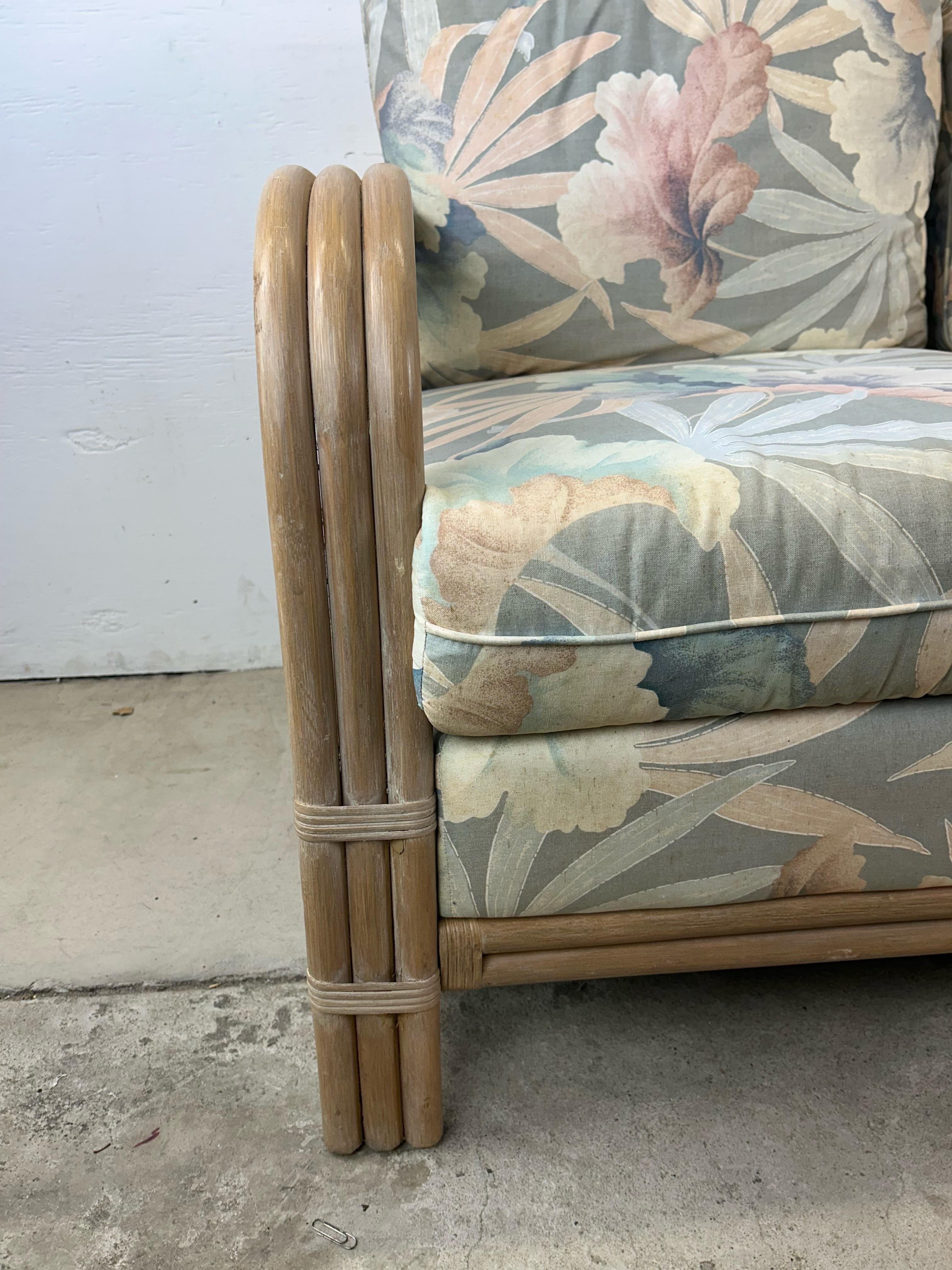 Vintage Boho Chic Rattan Loveseat with Floral Upholstery For Sale 1