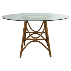 Table en rotin vintage bohème chic avec plateau rond en verre