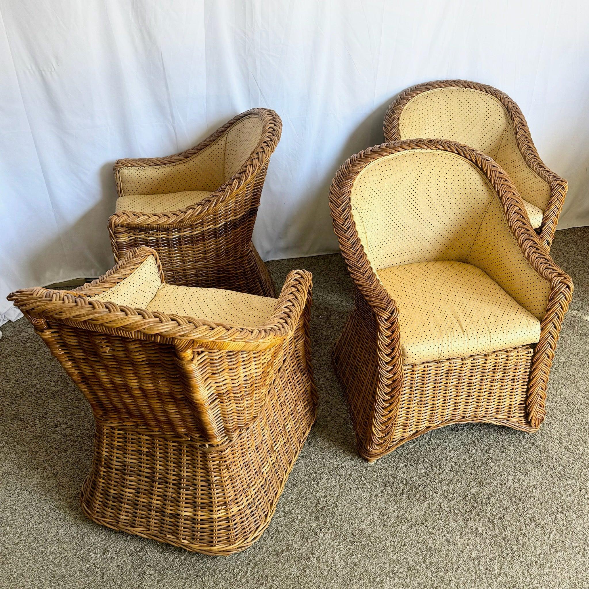 Set of four Vintage Boho Chic woven wicker dining armchairs with natural frames and curved armrests—ideal for adding rustic charm to your dining area.
 
 Some wear and discoloration to the fabric as shown in the photos. 
 
 We sell items as