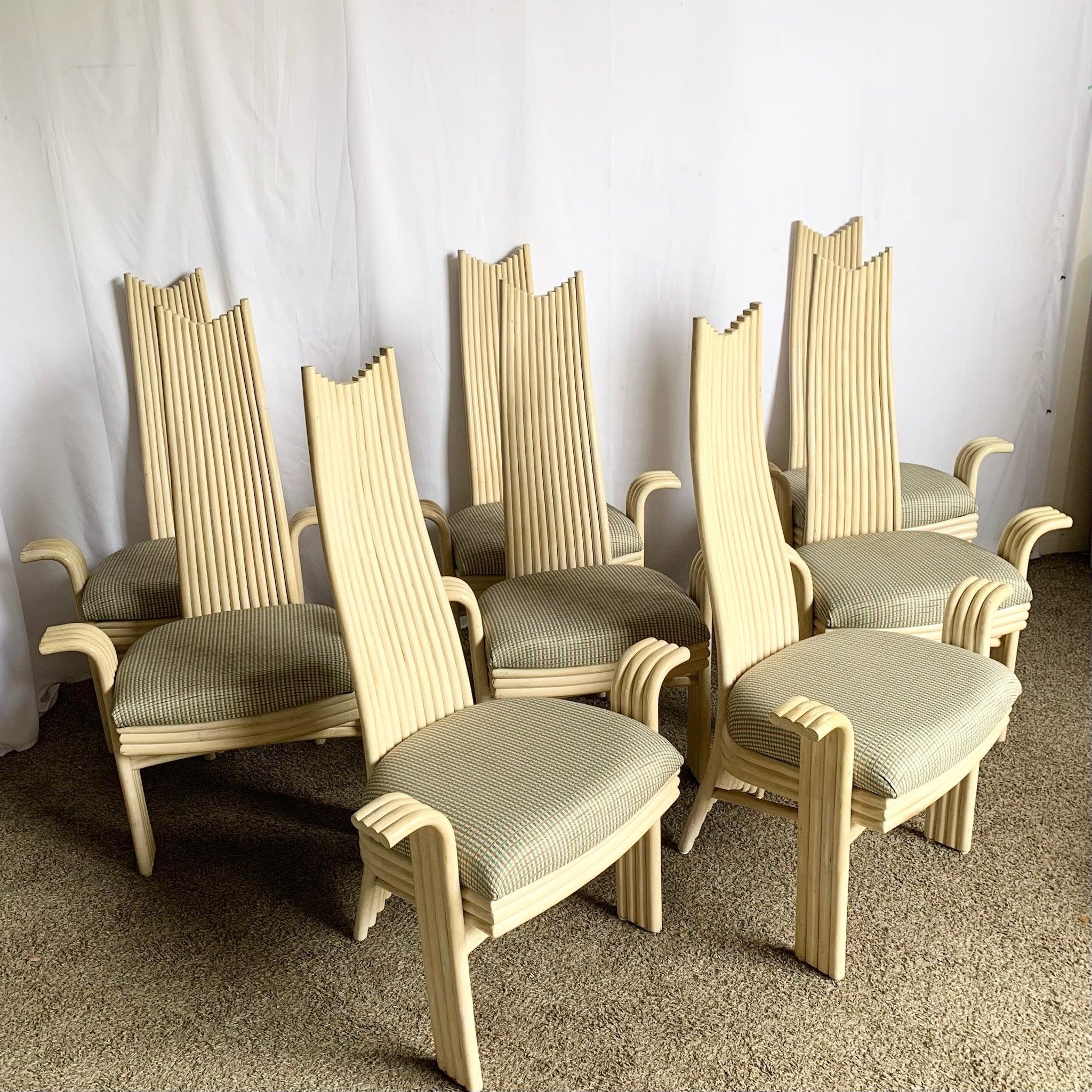 Boho Coastal Rattan High Back Dining Chairs set of eight—sculptural bamboo slats, warm tones, and resort-inspired vintage charm for coastal chic dining.
 

 

 

 Some wear to the finish on the edges and arm rests as shown in the photos.
 

 We sell