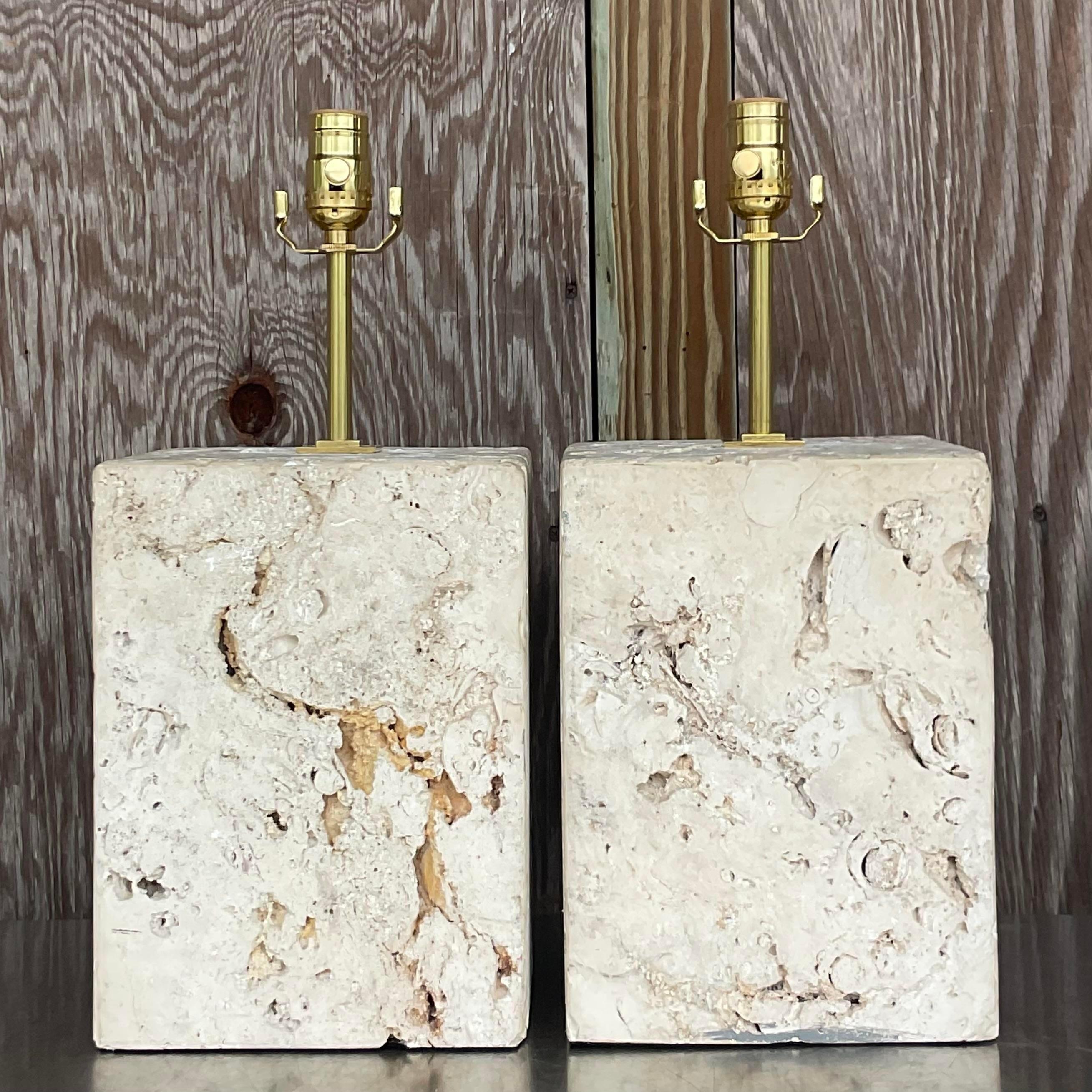 A fantastic pair of vintage Coastal table lamps. Beautiful coquina stone in a block shape. Fully restored with all new wiring and hardware. Acquired from a Palm Beach estate.
