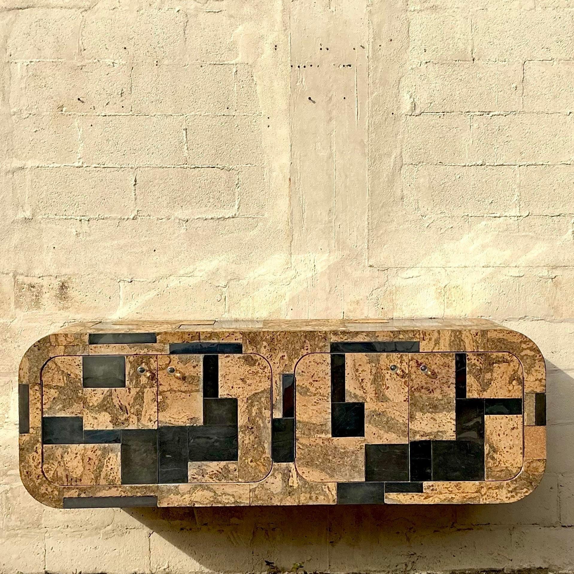 Elevate your space with this striking Vintage Boho Cork and Chrome Floating Wall Credenza, inspired by the iconic designs of Paul Evans. This credenza features a bold combination of textured cork front panels contrasted by sleek chrome framing,