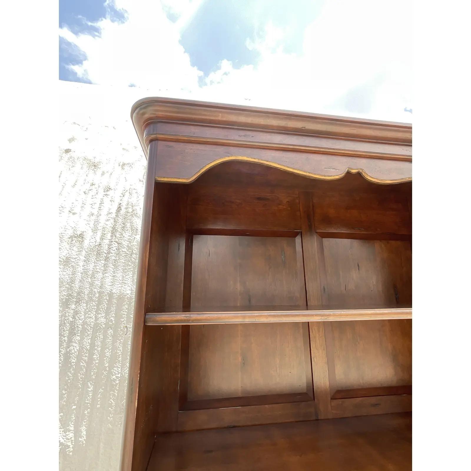 Fantastic custom built etagere. Monumental in size and drama. Beautiful Millwork design with gilt touches. Handy pull out table to extend one shelf. Perfect for a mini dry bar! Matching etagere without pullout table also available. Acquired from a