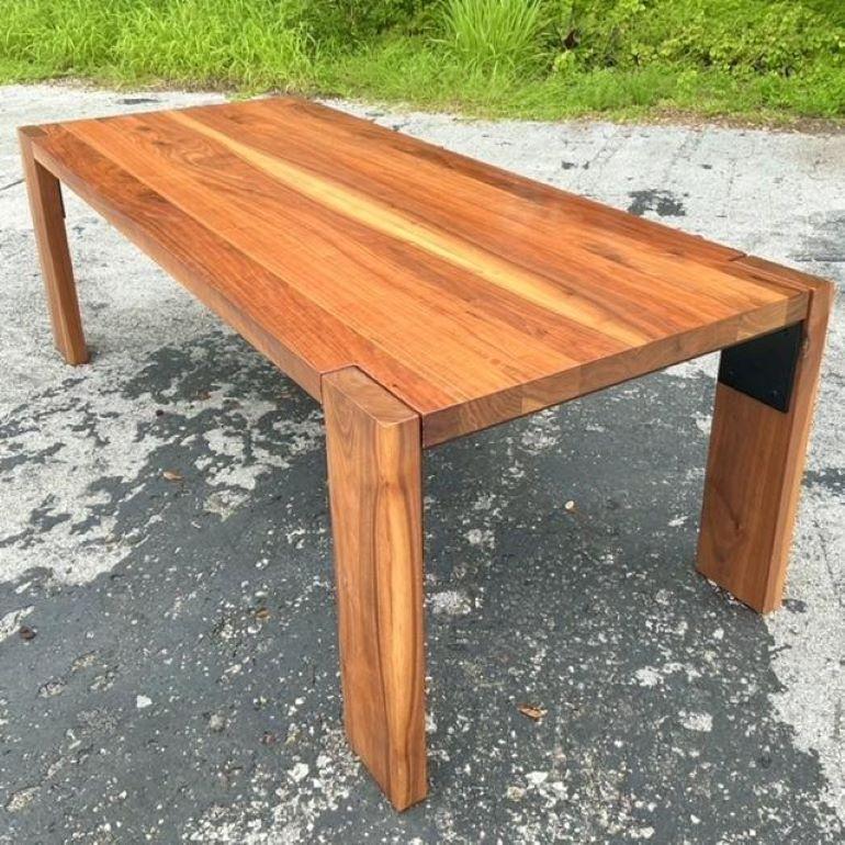 Invite rustic charm and bohemian elegance into your dining space with this Vintage Boho Custom Plank Dining Table. Handcrafted with meticulous attention to detail, this table features solid plank construction, showcasing the natural grain and