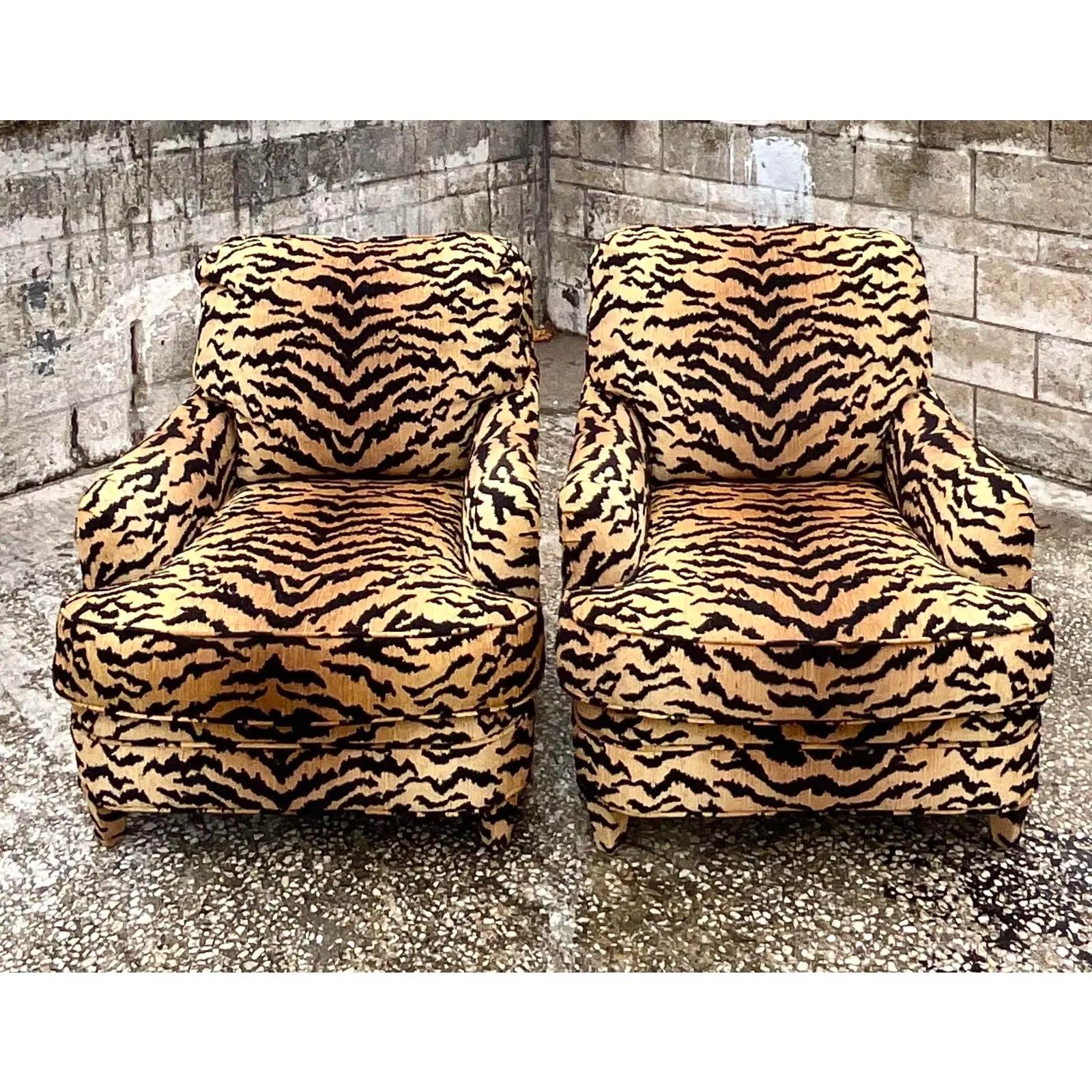 Incredible pair of vintage custom built club chairs. Gorgeous tiger stripe design in silk Devore. Deep and roomy for serious relaxing. Acquired from a Palm Beach estate.
