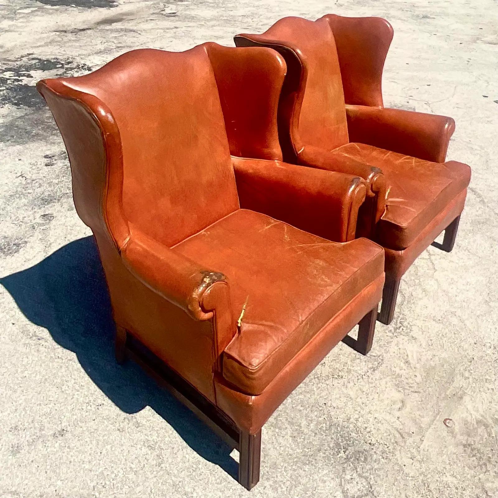 20th Century Vintage Boho Distressed Leather Wingback Chairs, a Pair