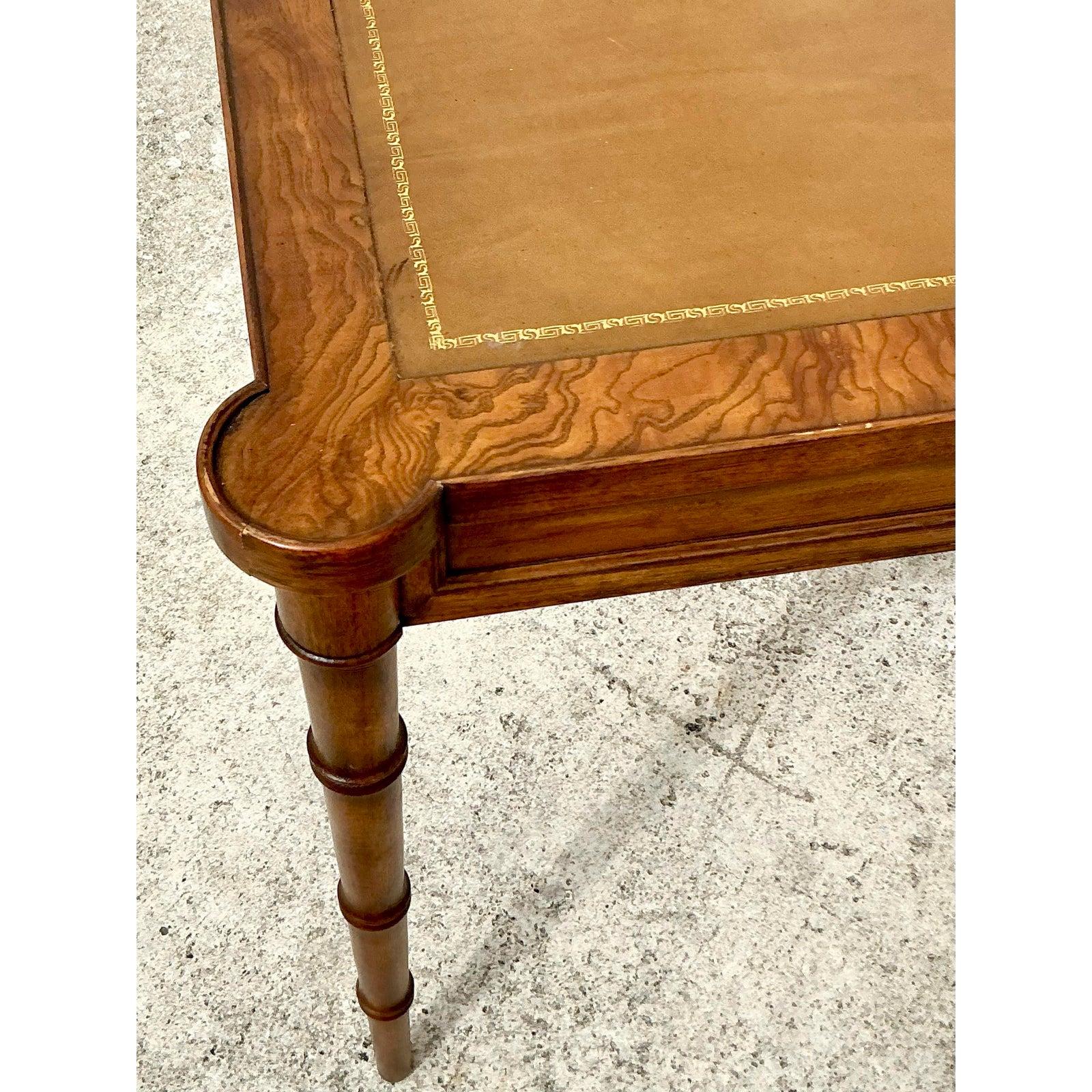 Discover the allure of refined craftsmanship with this exceptional Vintage Drexel Burl Wood and Leather Game Table, a testament to sophisticated design and versatile functionality. This exquisite table features a captivating burl wood border that