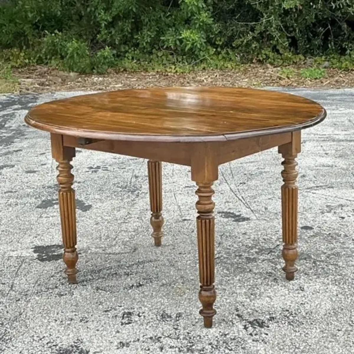 This vintage boho drop leaf dining table combines style and versatility. With its warm, natural wood tones and space-saving design, it’s perfect for cozy dining areas, offering both function and a laid-back, eclectic charm.
