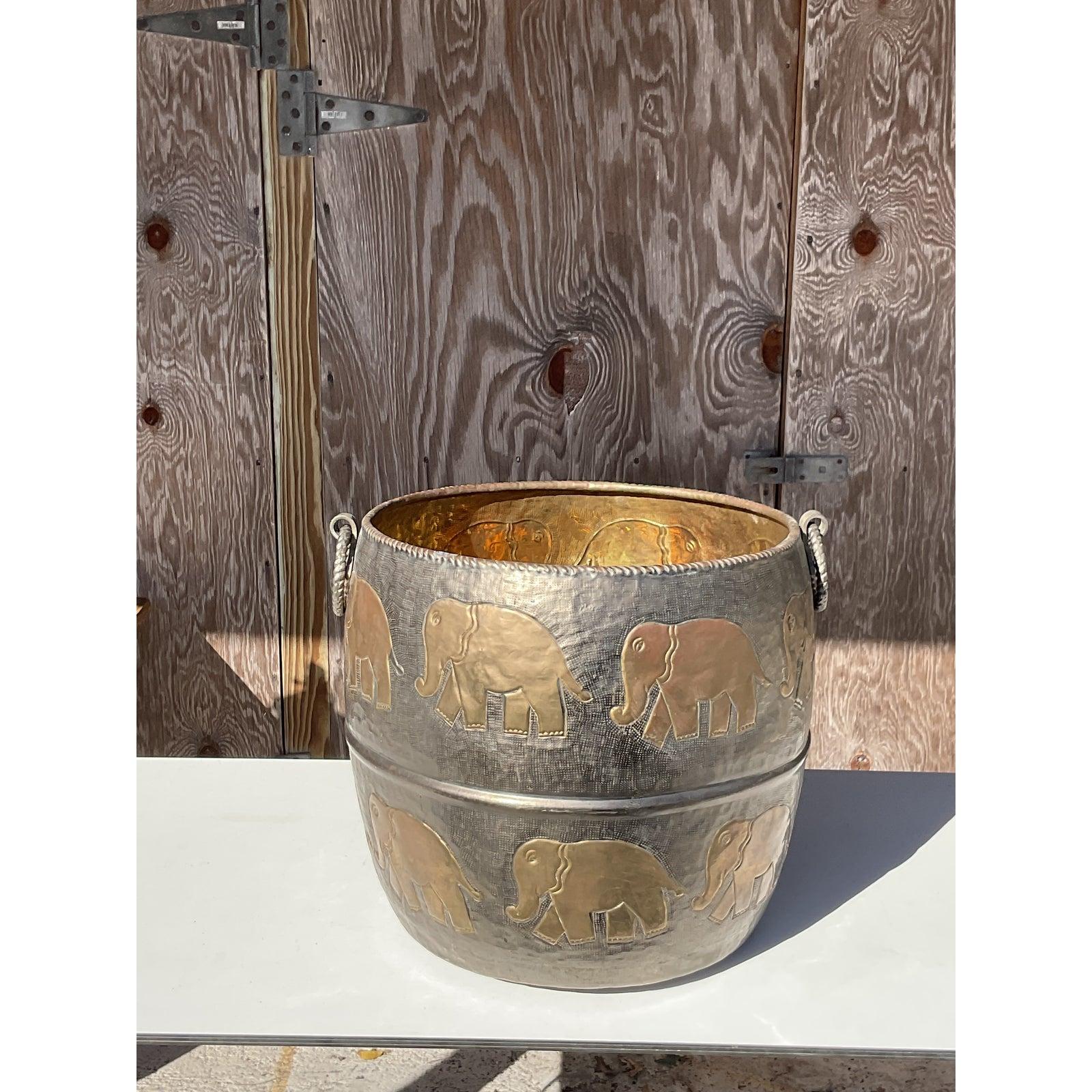 Fantastic vintage metal planter. A chic elephant walk design in hammered brass. Perfect as is or use for your plants. You decide! Acquired from a Palm Beach estate.