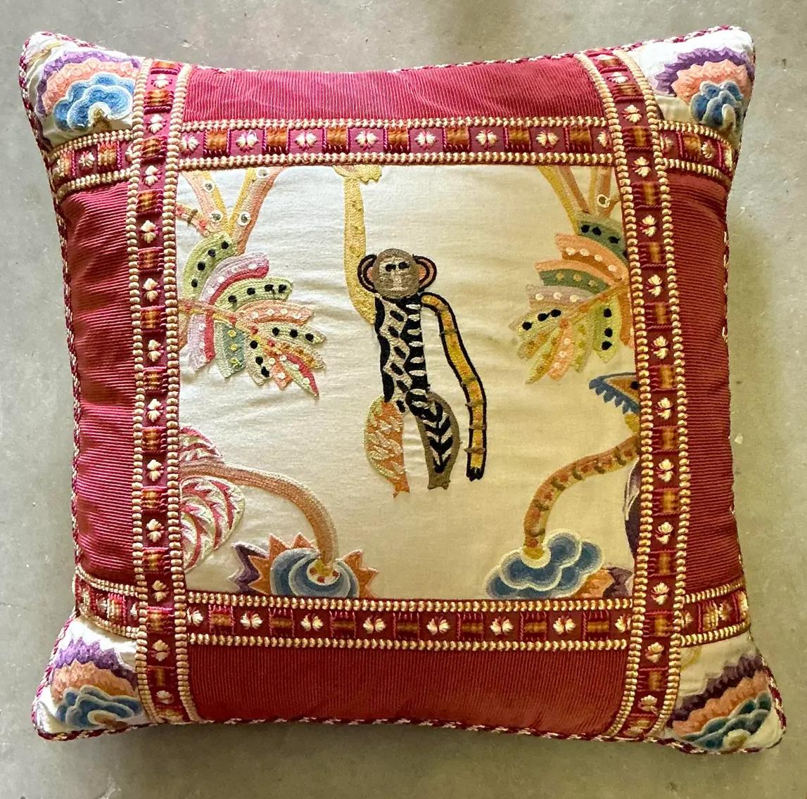 Elevate your space with this whimsical vintage boho pillow, featuring a beautifully embroidered playful monkey motif. Handcrafted with intricate details, the vibrant design adds a touch of eclectic charm to any room. Perfect for bohemian and