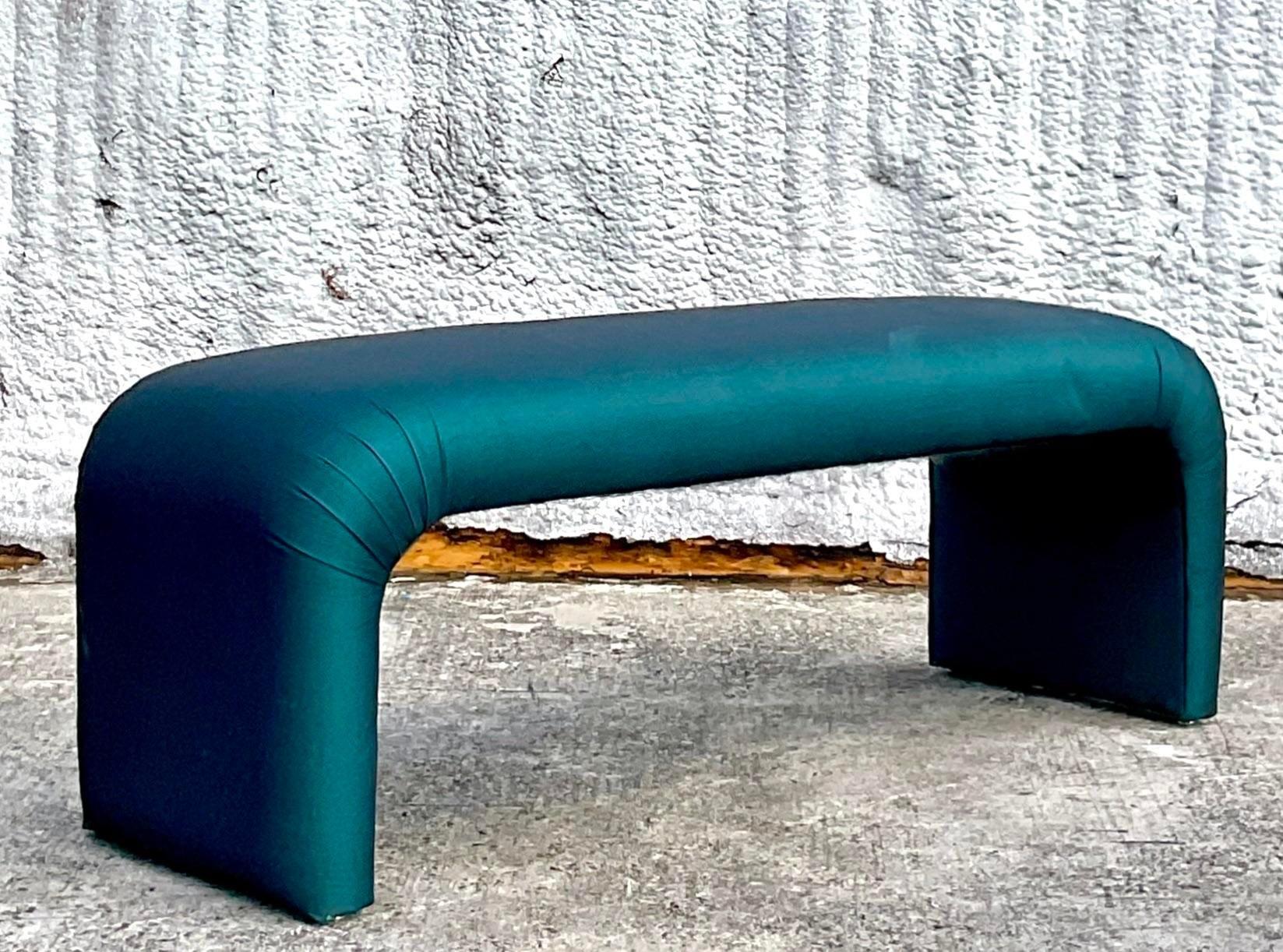 A fabulous vintage Boho upholstered bench. A chic waterfall shape in a brilliant green color. Acquired from a CT estate.