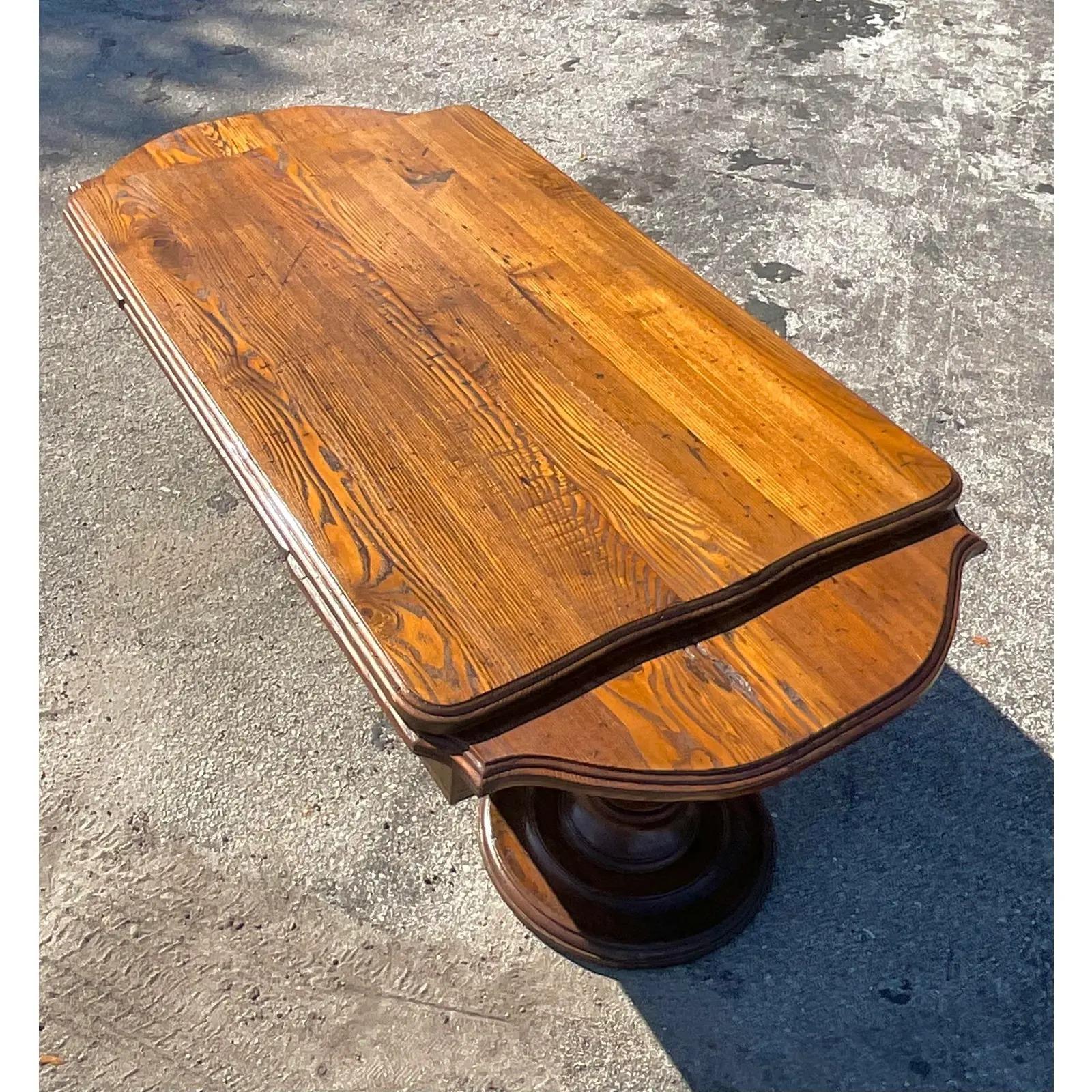 A fabulous vintage Boho pine coffee table. A chic little table with fully extendable ends for extra surface space. Great for entertaining. Owned by the Iconic Lily Pulitzer and acquired directly from her family. A real slice of American