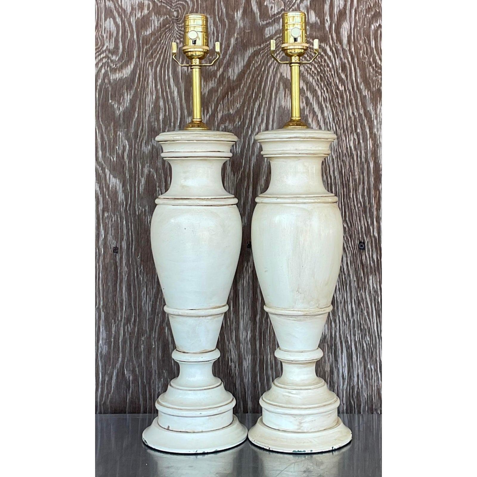 A fabulous pair of vintage boho turned wood lamps. A faux finish on a classic Baluster shape. Acquired from a Palm Beach estate.

The lamps are in great vintage condition. Minor scuffs and blemishes appropriate to their age and use. Chips to the