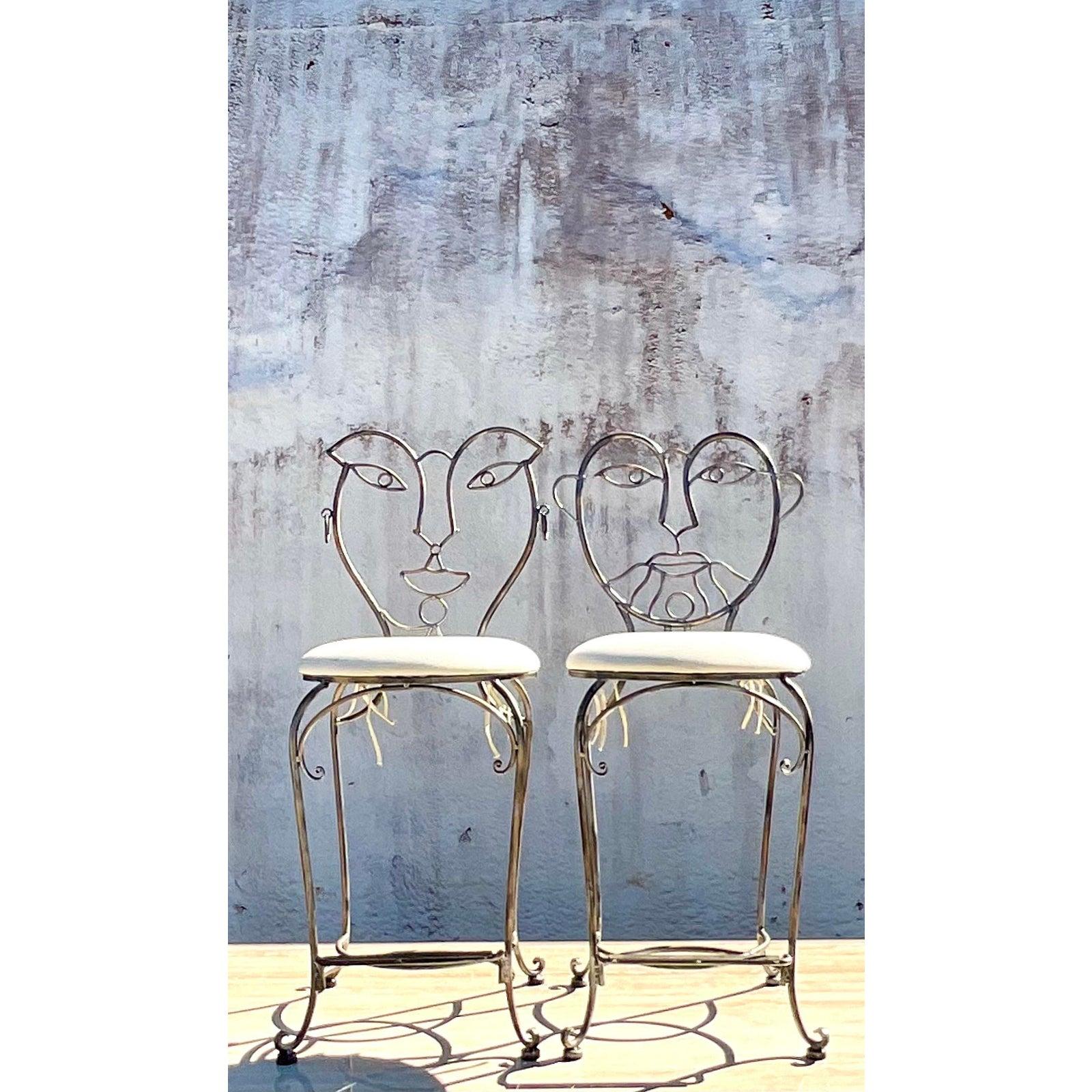 A fabulous pair of wrought iron bar stools. Done in the manner of John Risley and his iconic figurative characters. A charming addition to any décor. Acquired from a Palm Beach estate.