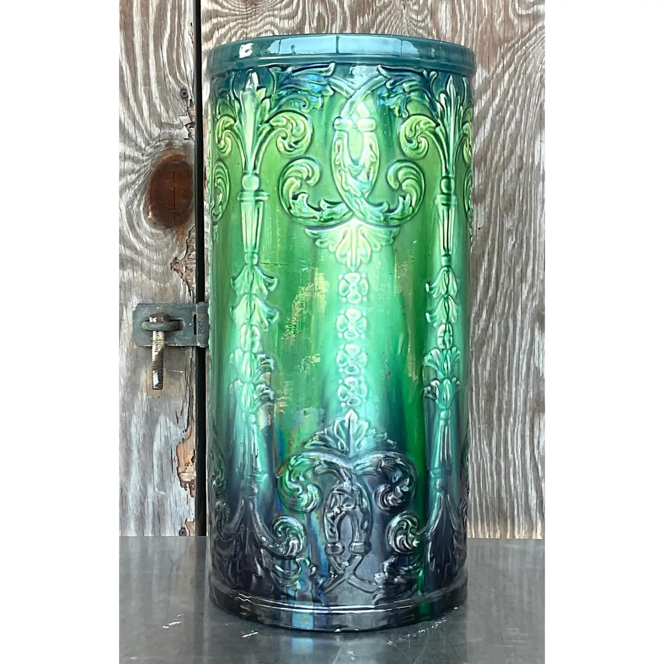 A fantastic vintage umbrella stand in multiple shades of greens with elaborate engravings. Acquired in a Palm Beach estate.