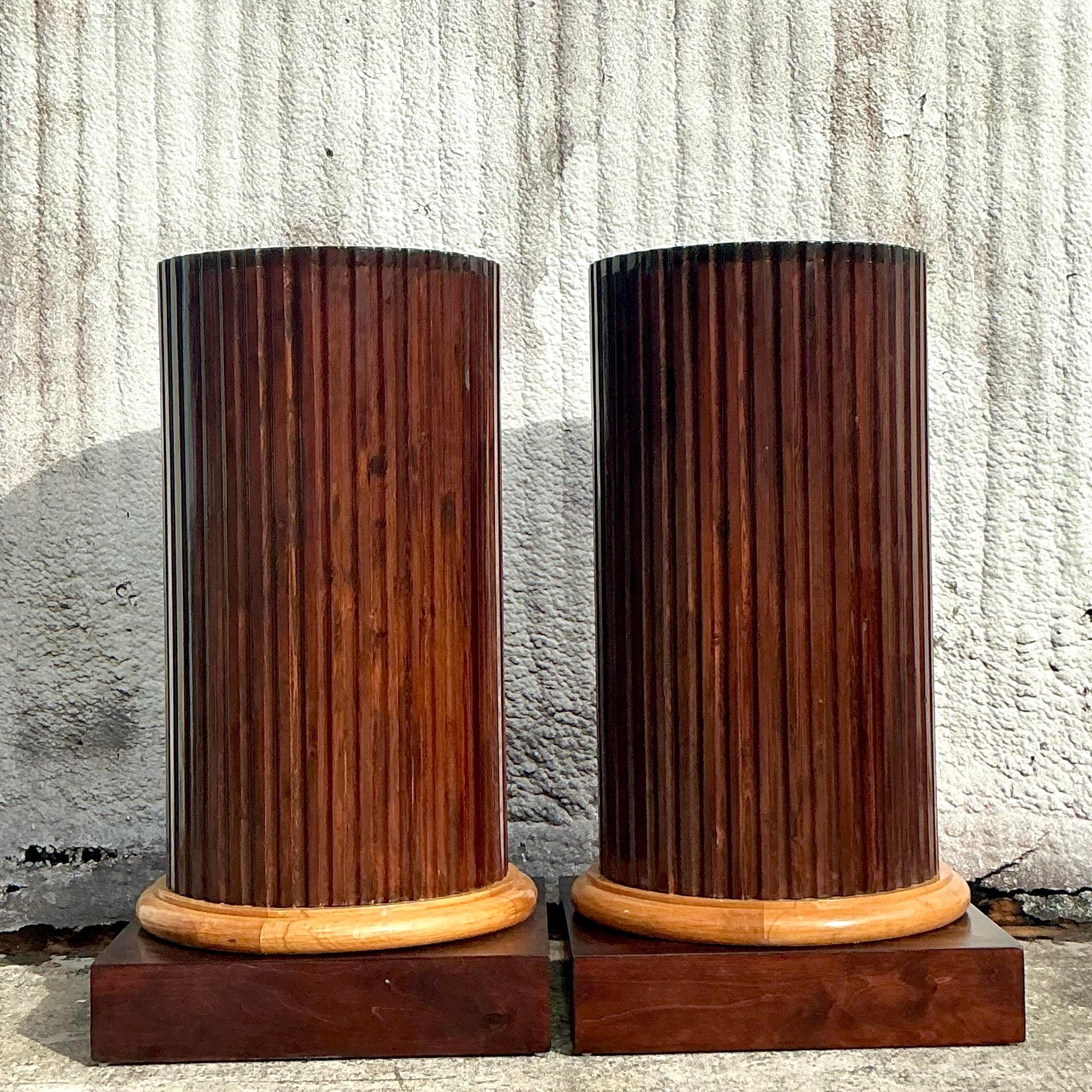 Make a grand statement with this pair of Vintage Boho Monumental Fluted Column Pedestals. These striking pieces feature elegant fluted detailing and a timeless column design that adds height, texture, and sophistication to any space. Perfect for