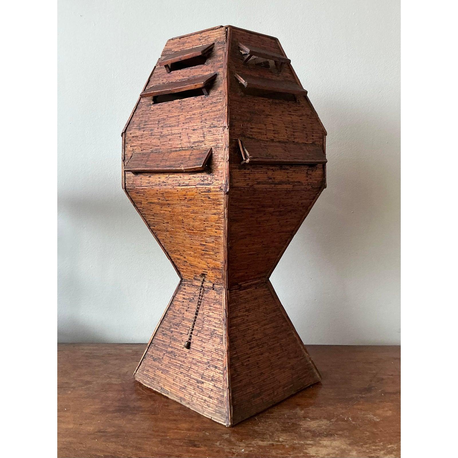 Discover a truly unique piece of handcrafted artistry with this vintage Folk Art matchstick table lamp. This captivating lamp showcases an extraordinary polygonal form, meticulously constructed from countless matchsticks to create a rich, textured