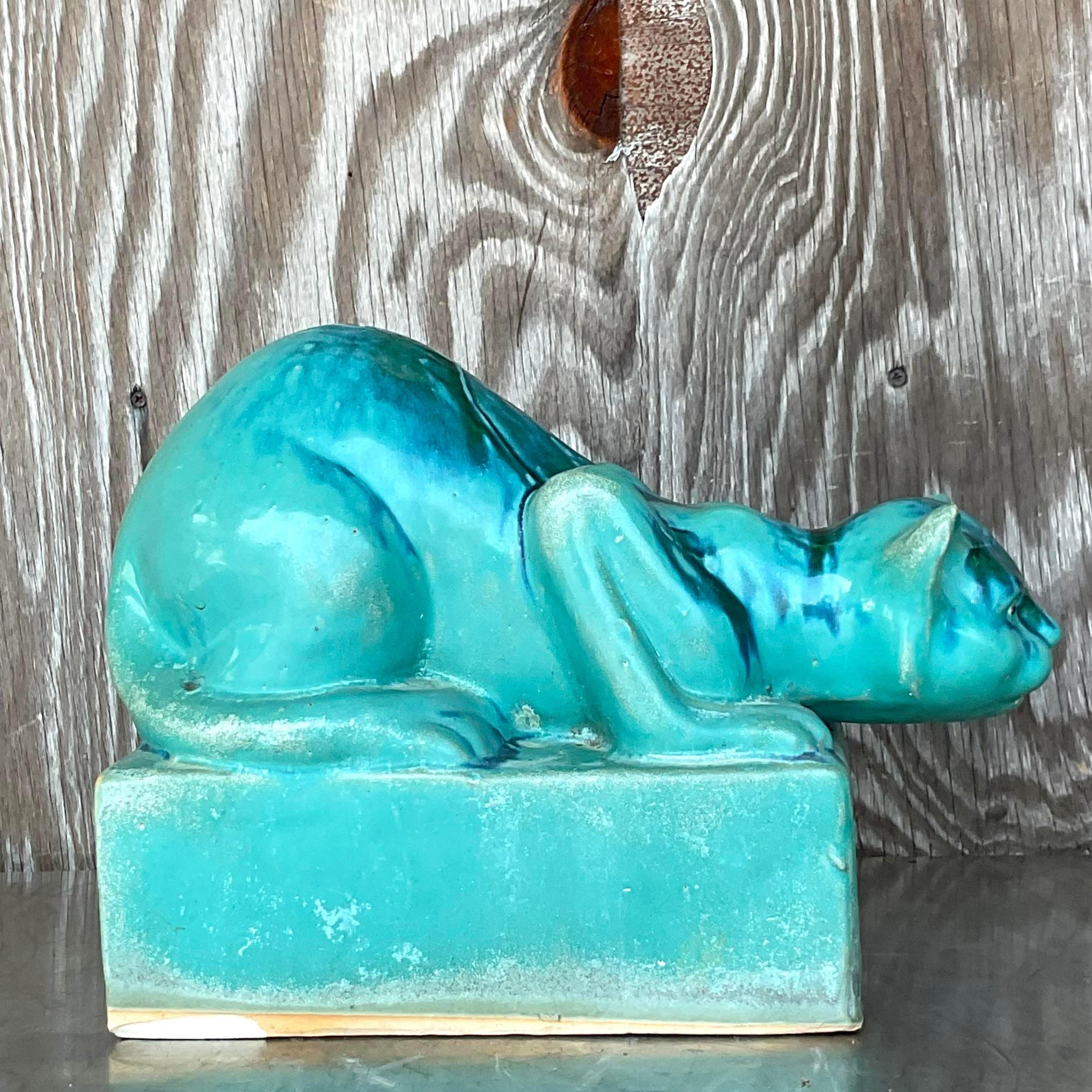 A fabulous vintage Boho cat. A chic glazed ceramic finish with the most beautiful blue green color. Acquired from a Palm Beach estate.
