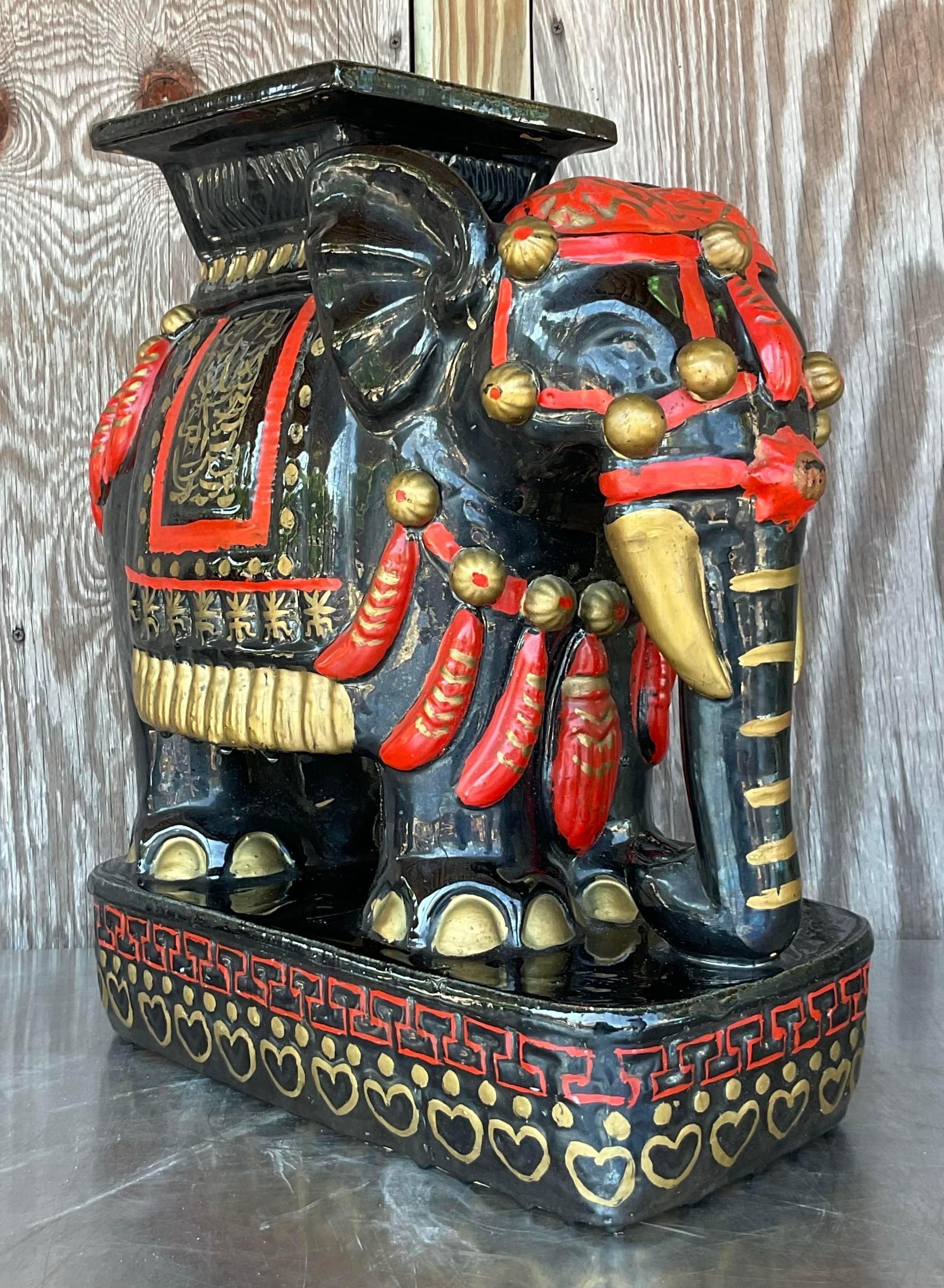 Infuse your home with eclectic charm using this Vintage Boho Glazed Ceramic Elephant Low Stool. Its vibrant glaze and whimsical design make it a versatile piece, blending playful boho aesthetics with classic American decor.