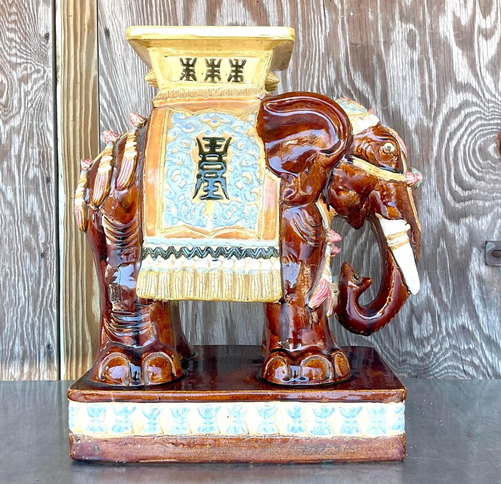 A fabulous vintage Boho elephant stool. A chic hand painted ceramic with a high gloss finish. Perfect indoors or out. Acquired from a Palm Beach estate.