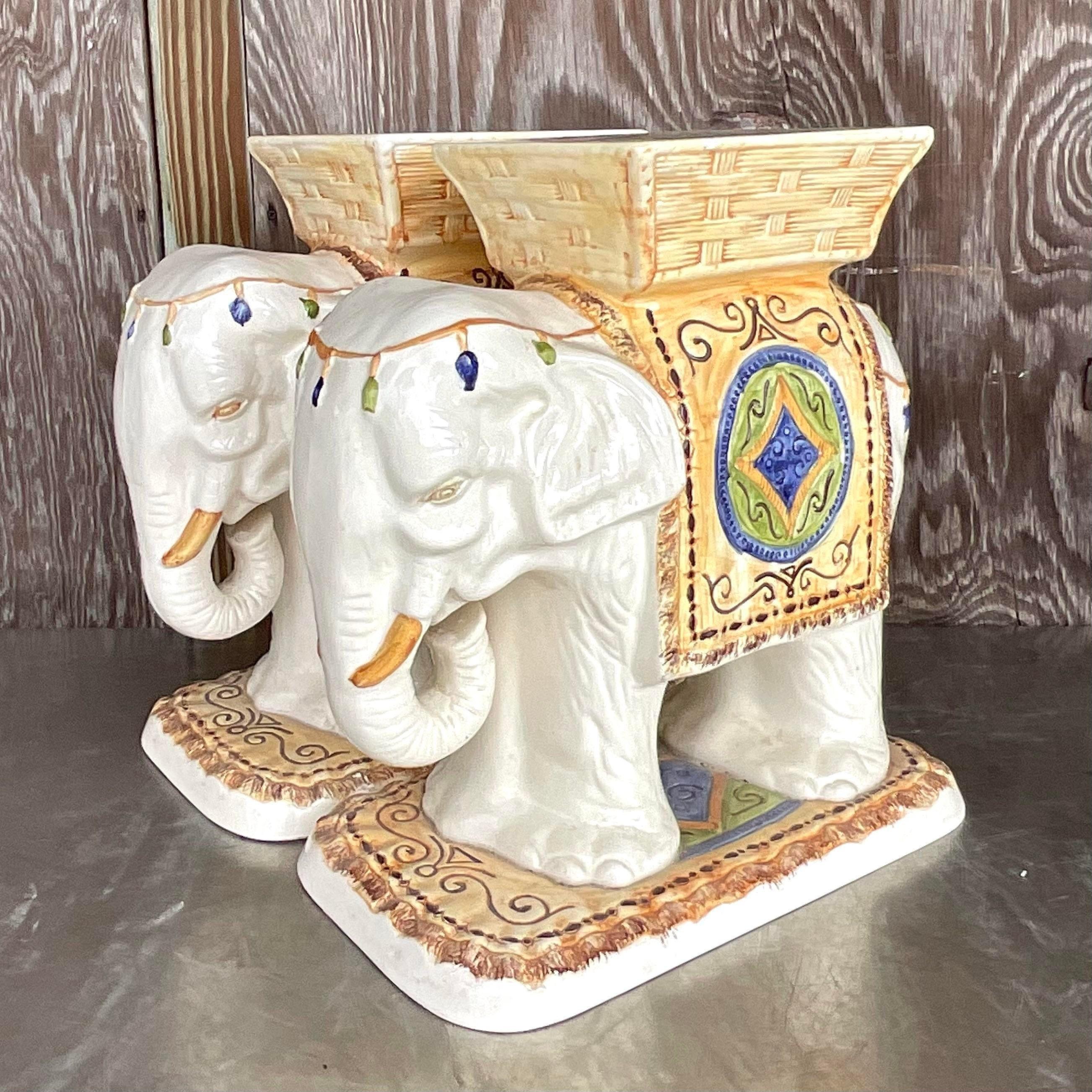Bohemian Elegance: Vintage Glazed Ceramic Elephant Stools - A Pair. Add a touch of exotic flair to your space with these American-crafted treasures, combining boho charm with timeless sophistication for a statement seating option that captivates