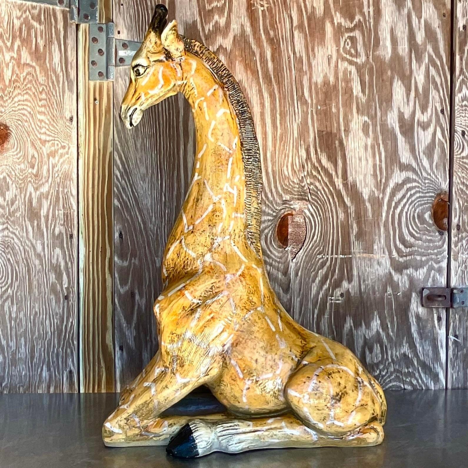 A fabulous vintage Boho giraffe. A tall and slender animal with beautiful hand painted detail. Acquired from a Palm Beach estate.